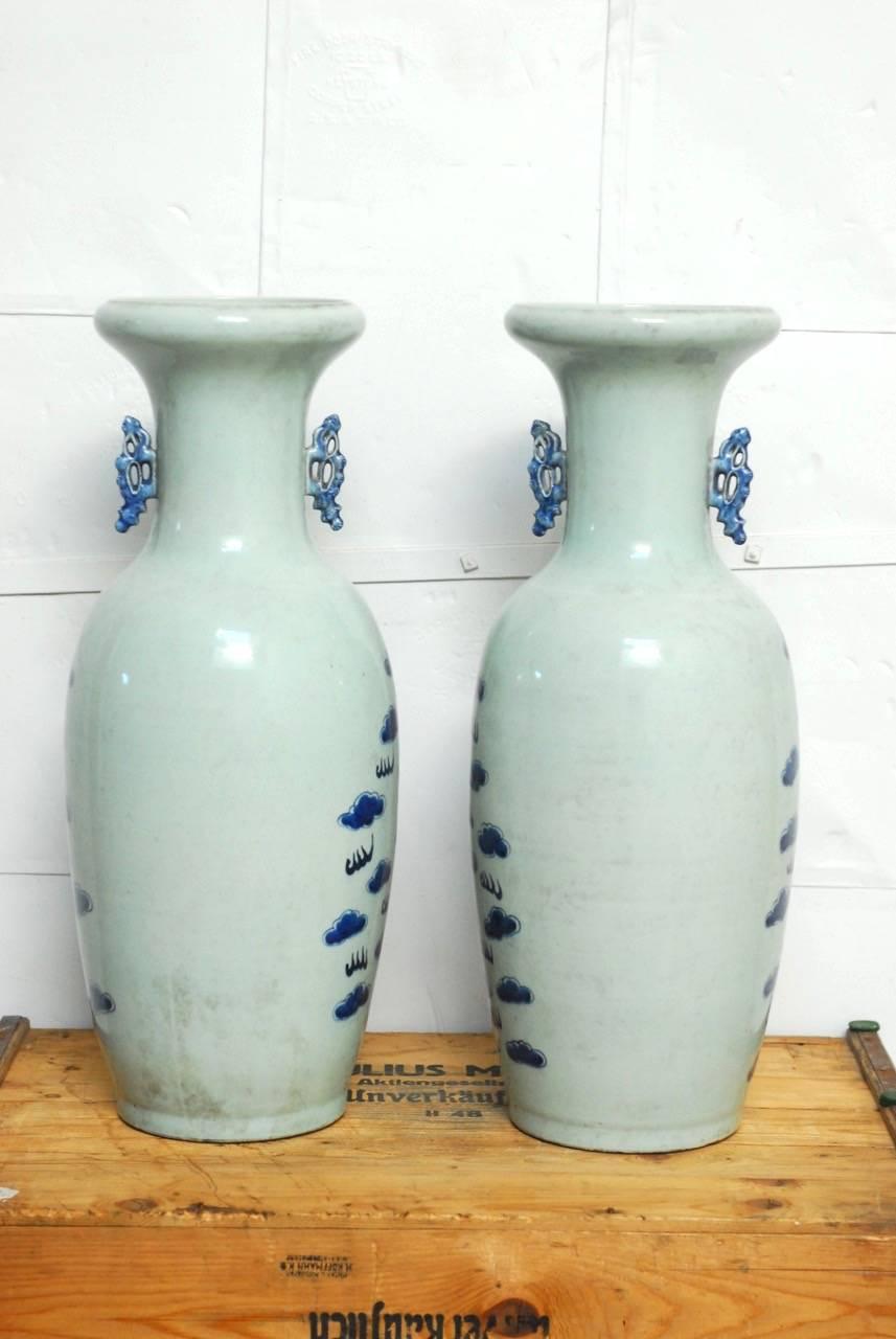 Porcelain Pair of Chinese Blue and White Ceramic Dragon Vases 