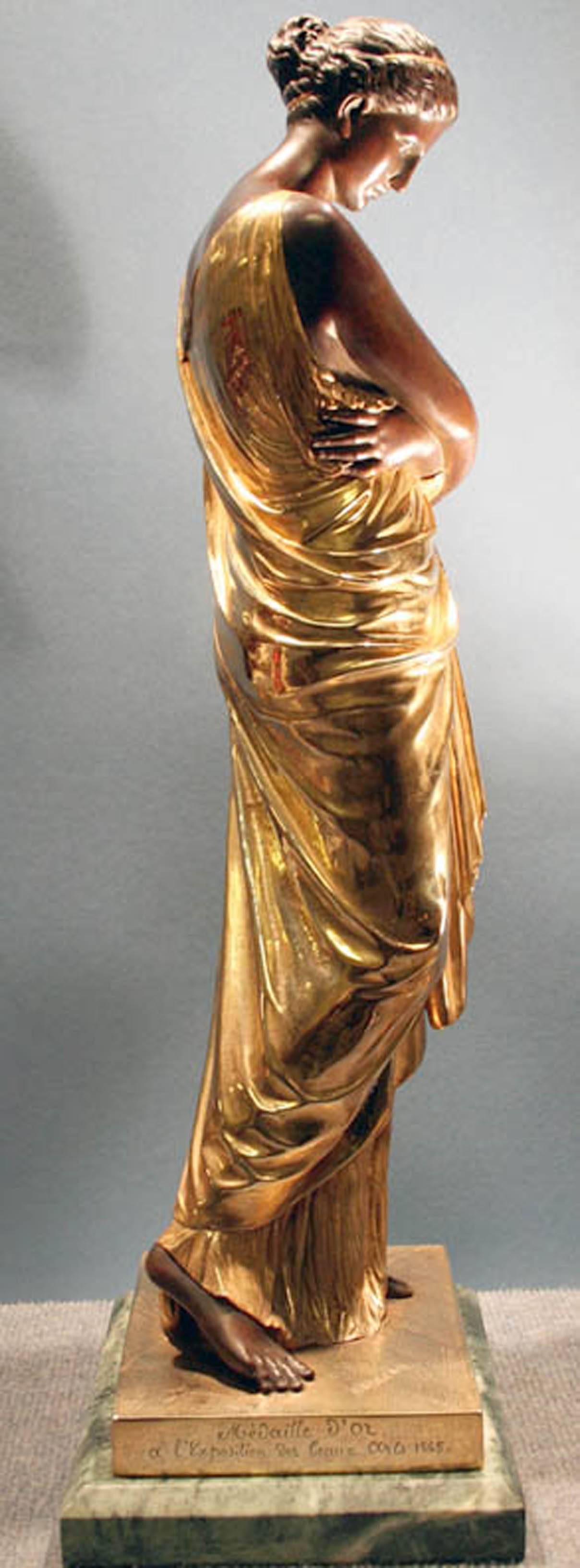 Auguste Marie Barreau (French, d.1922)

Young woman in Grecian dress.

A gilt and patinated bronze statue, signed on the base and inscribed “Médaille d’Or à l’Exposition des Beaux Arts 1865” and “Acheté par l’État”. 

Height: 24.5”