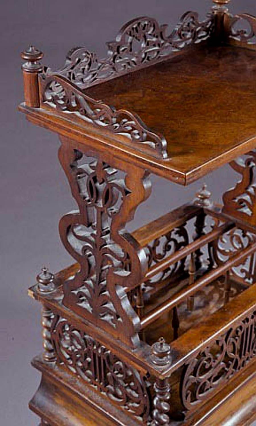 Fine Antique Renaissance Revival Burled Walnut Canterbury or Whatnot, with a rectangular top shelf with a three quarter pierced gallery supported by pierced vasiform side panels. The lower section with dividers and openwork front, side  and back