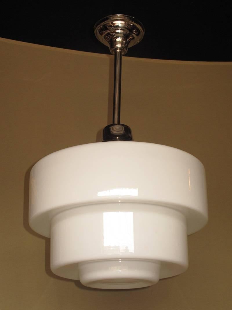 Two matching available, priced each.
 Statement fixtures, rarely seen in this large of size. Vintage milk glass globes with your choice of fitter; flush mount, chain hung, or pole hung (shown). Also your choice of color or finishes with polished