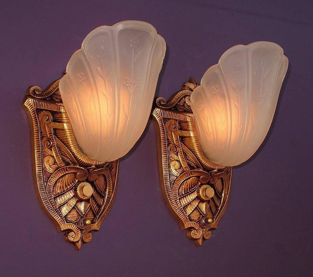 1920s possibly early 1930s pair of restored wall sconces with original slip shades. Unique stripping pattern in all the details giving it a look of wicker or hickory cane. There is also a slight nautical and Spanish Revival feel to them. Very well