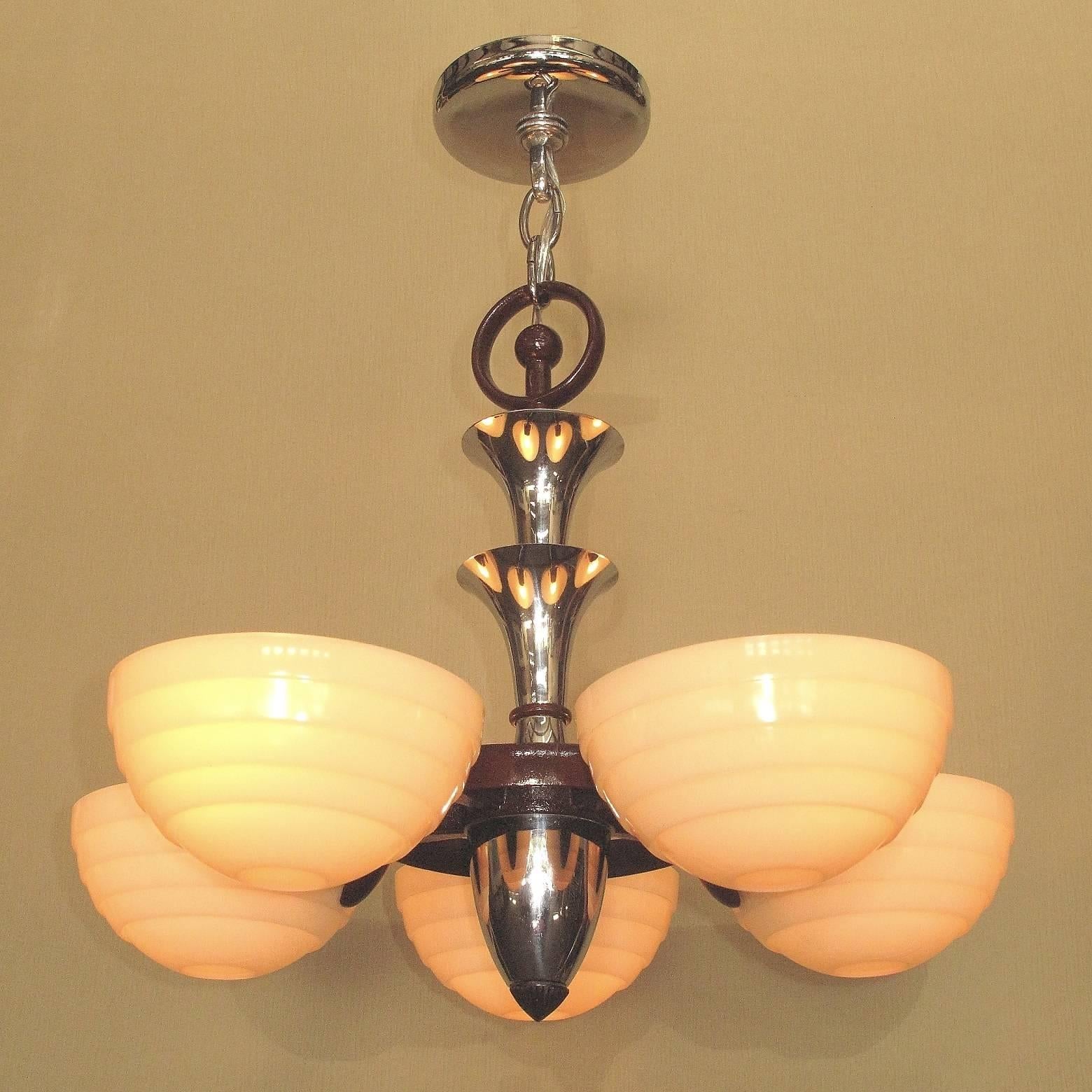 This cast iron and chrome fixture shows the distinct direction design & style was taking in the 1930s, moving from Art Deco to what we now call Mid-Century.
 The chrome has been polished to bring back it's original luster and the cast iron