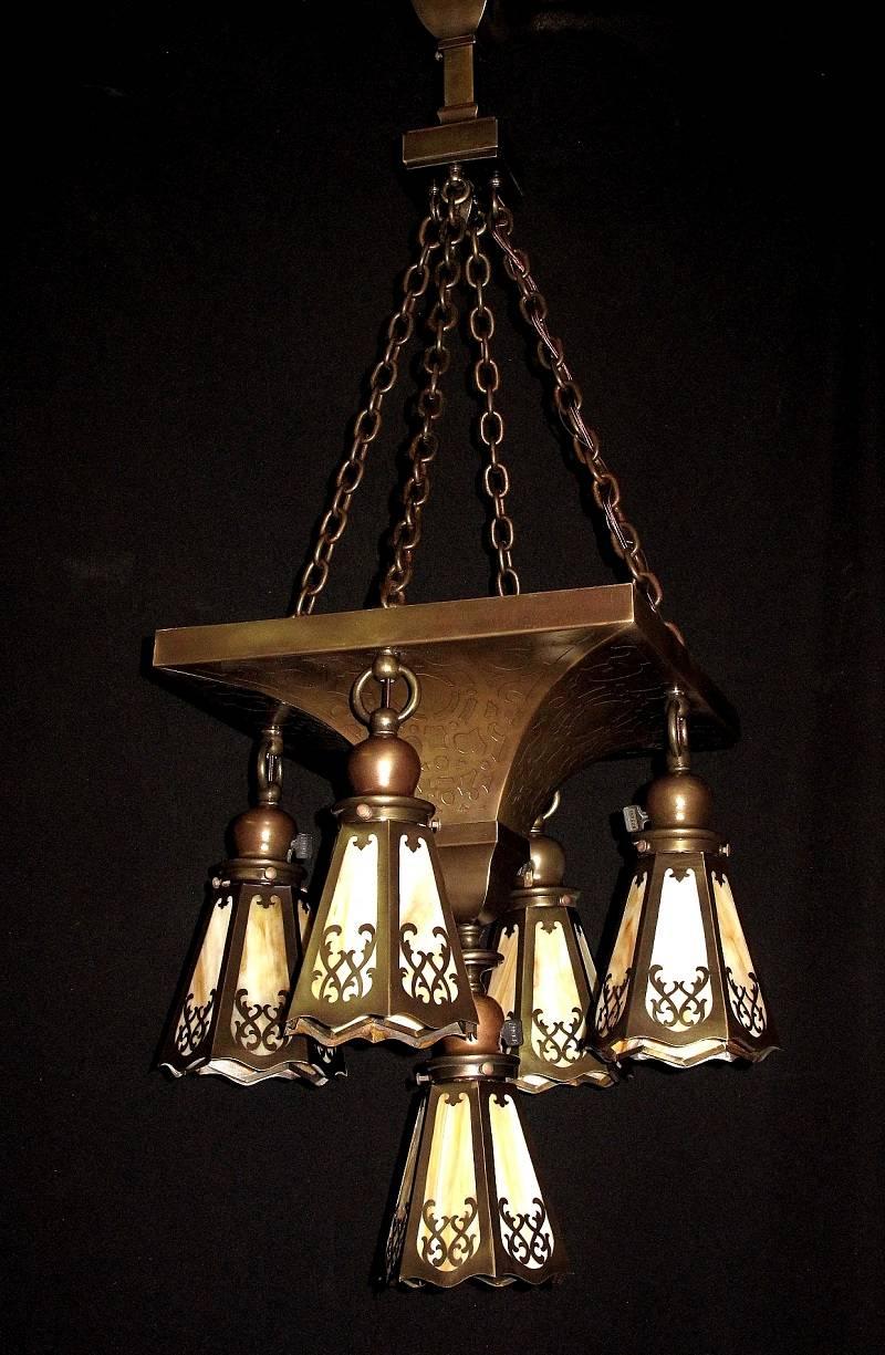Impressive five-light fixture which shows the mastery of workmanship and design of the Craftsman era. One of those masterpieces which just do not come along very often. Another aspect of this wonderful piece is that would work wonderfully in many