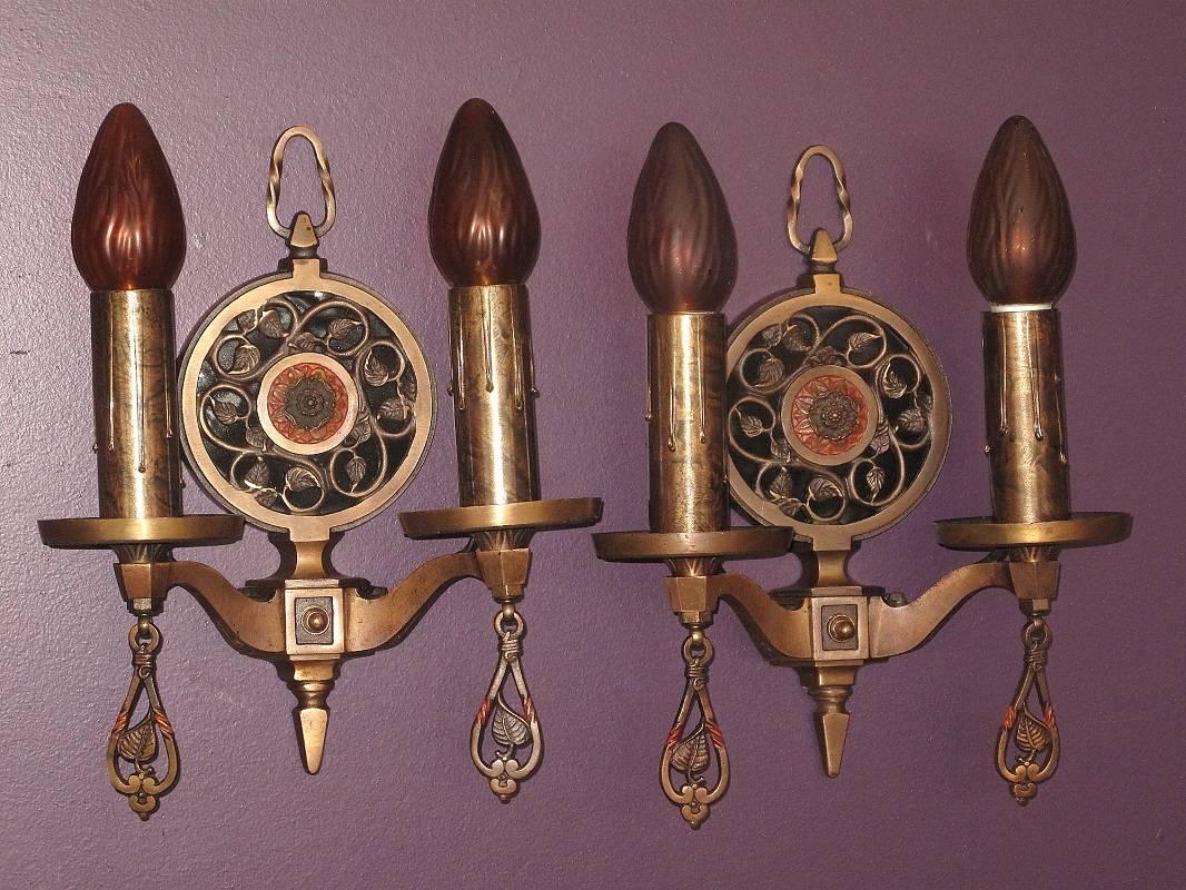 Two pair available, priced per pair. These sconces have been very well cared for throughout their life as indicated by excellent condition the original finish and patina is in. They have been gently washed and lightly waxed to keep them looking