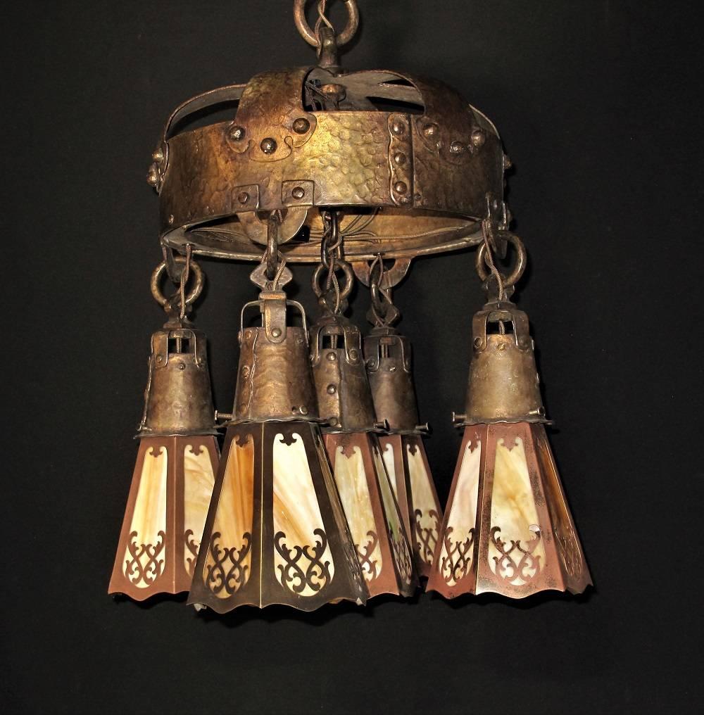 Wonderful and heavy Arts & Crafts era five-light ceiling fixture with it's original finish and patina intact. Made of bronze or brass plated cast iron and bronze. Perfect for an entry light or over the dining room table. The centrepiece for