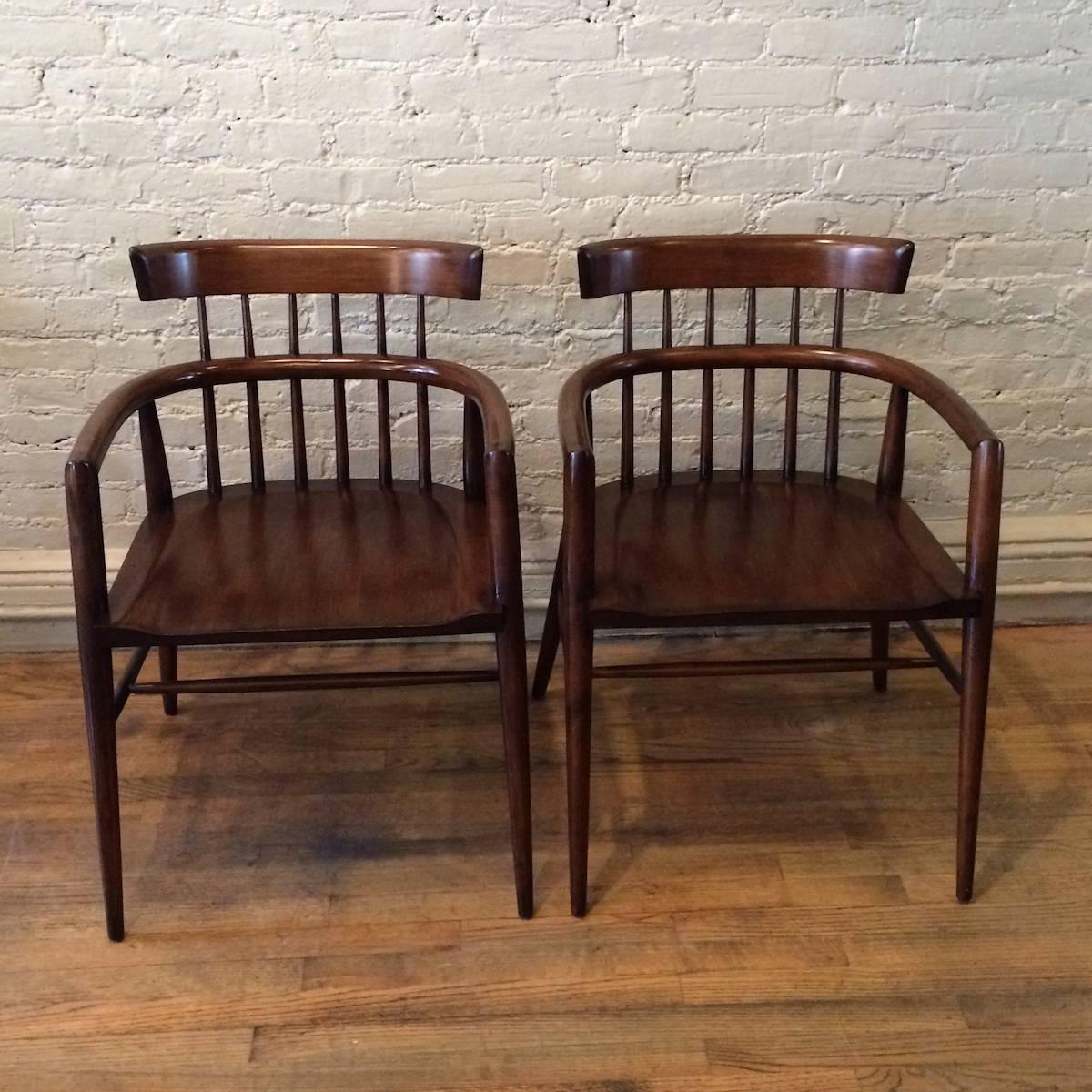 Pair of Mid-Century Modern, maple wood, spindle back, windsor style chairs by Paul McCobb for Planner Group in restored condition.