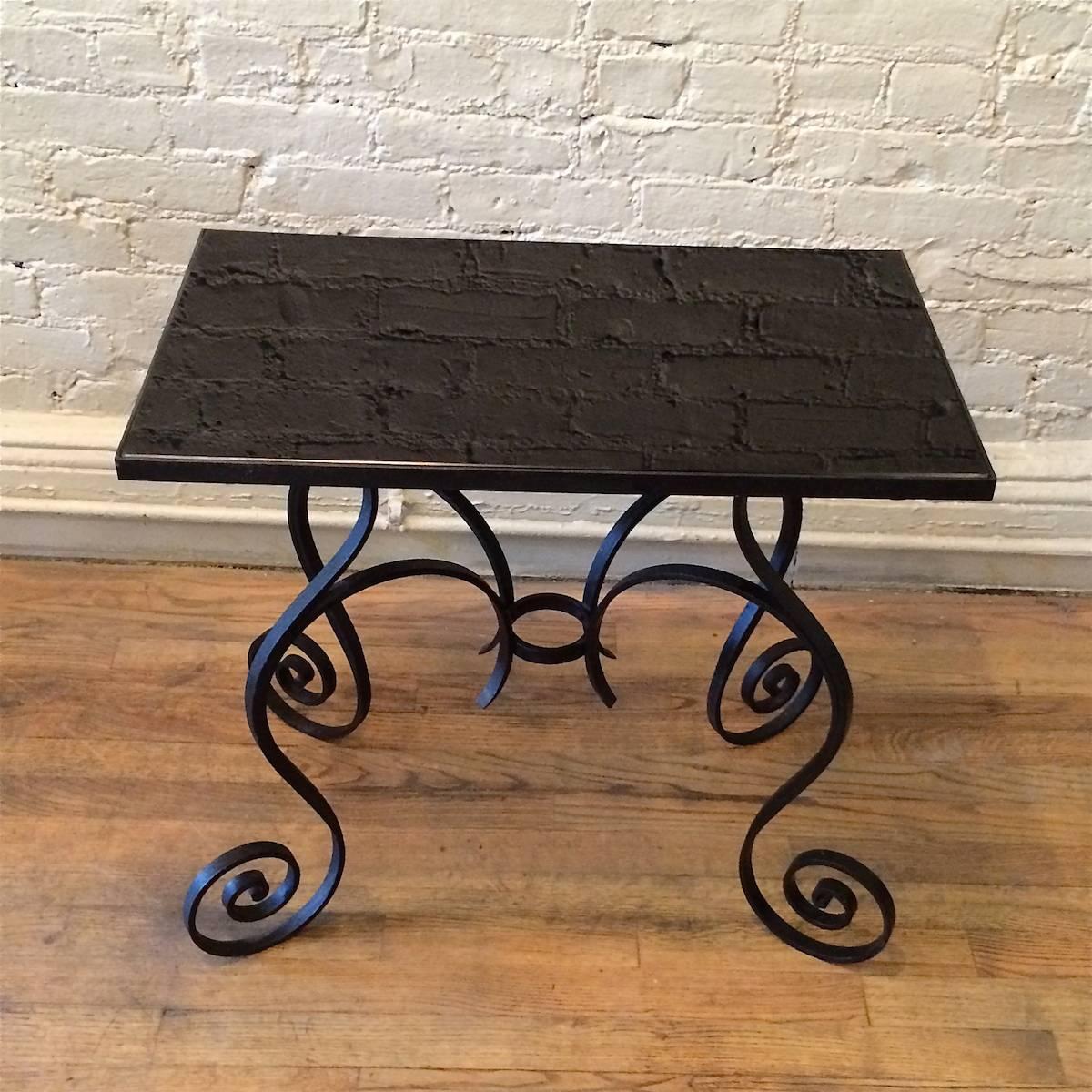 Hollywood Regency Scrolled Wrought Iron and Black Vitrolite Side Table In Good Condition In Brooklyn, NY