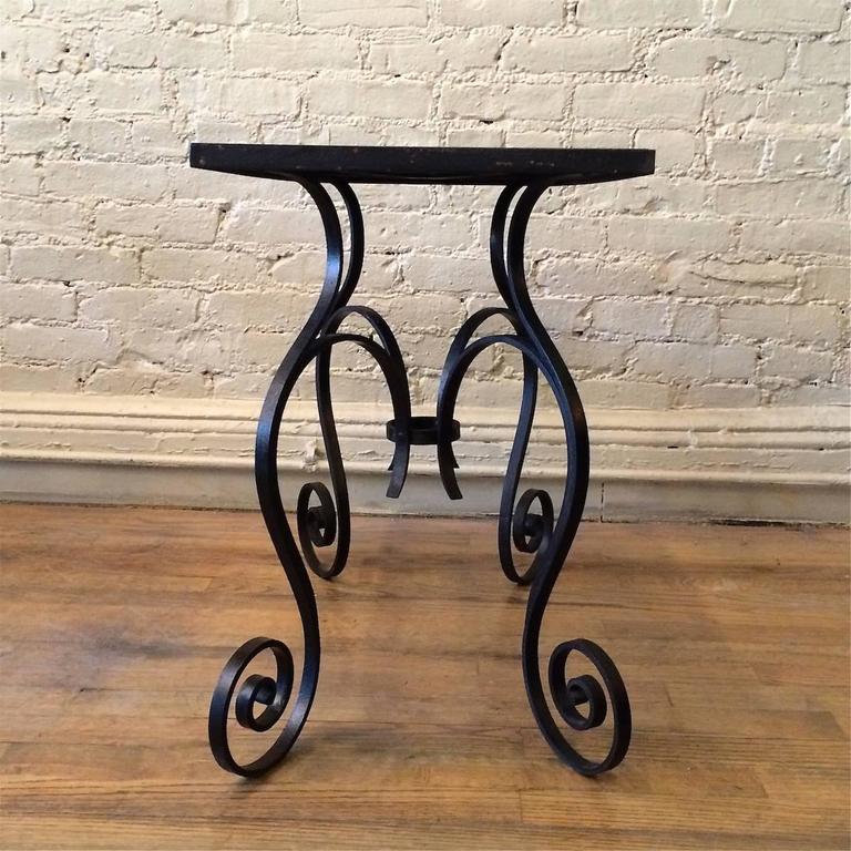 Hollywood Regency Scrolled Wrought Iron and Black Vitrolite Side Table