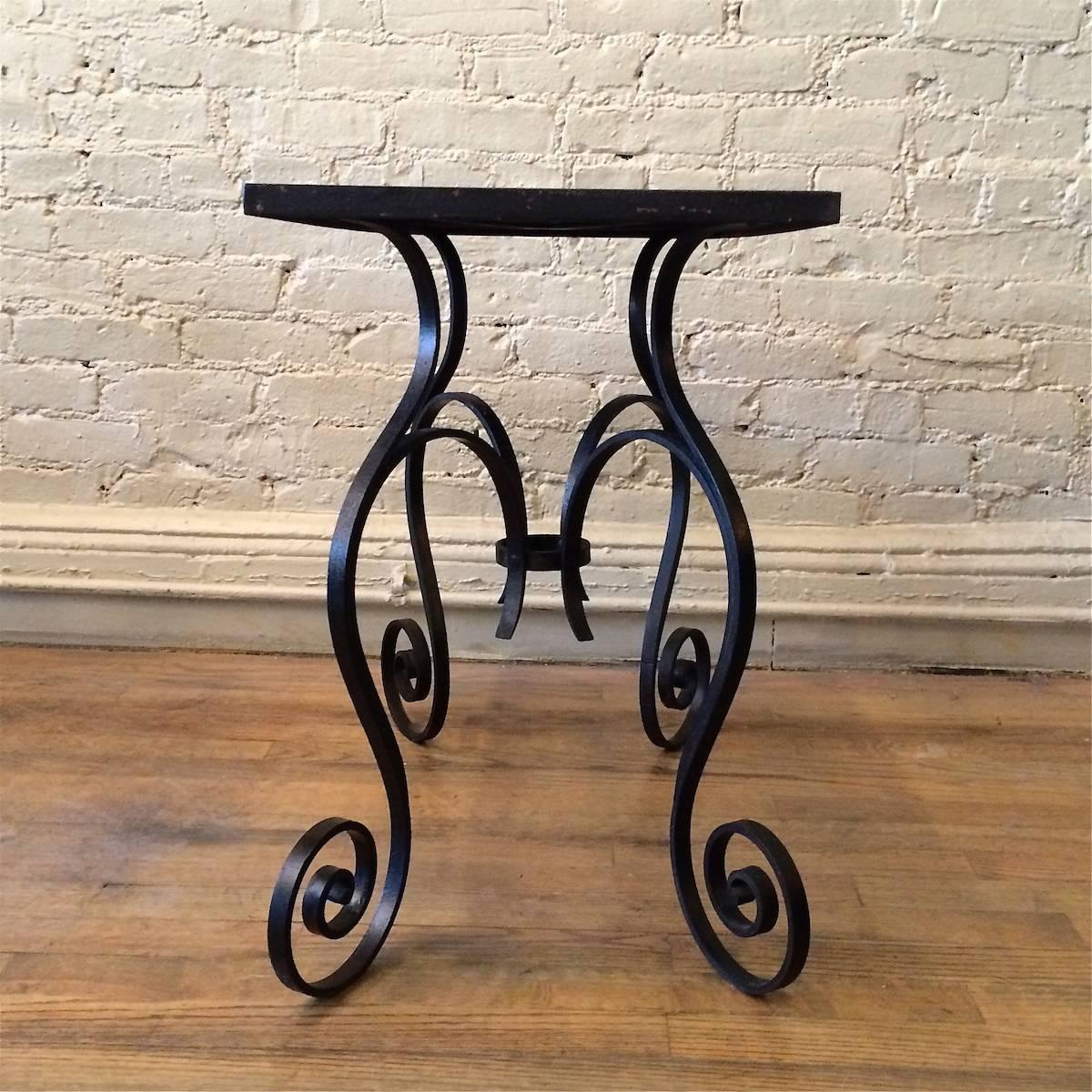Hollywood Regency Scrolled Wrought Iron and Black Vitrolite Side Table