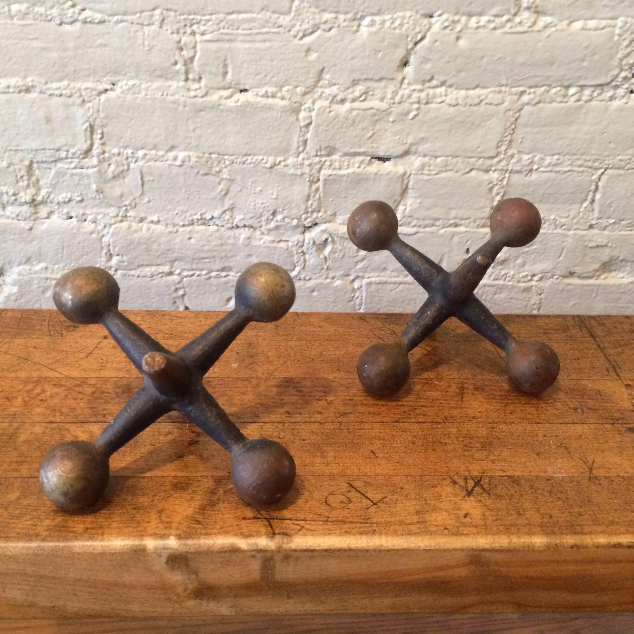 Mid-Century Modern Pair of Large Mid-Century Cast Iron Jacks or Bookends