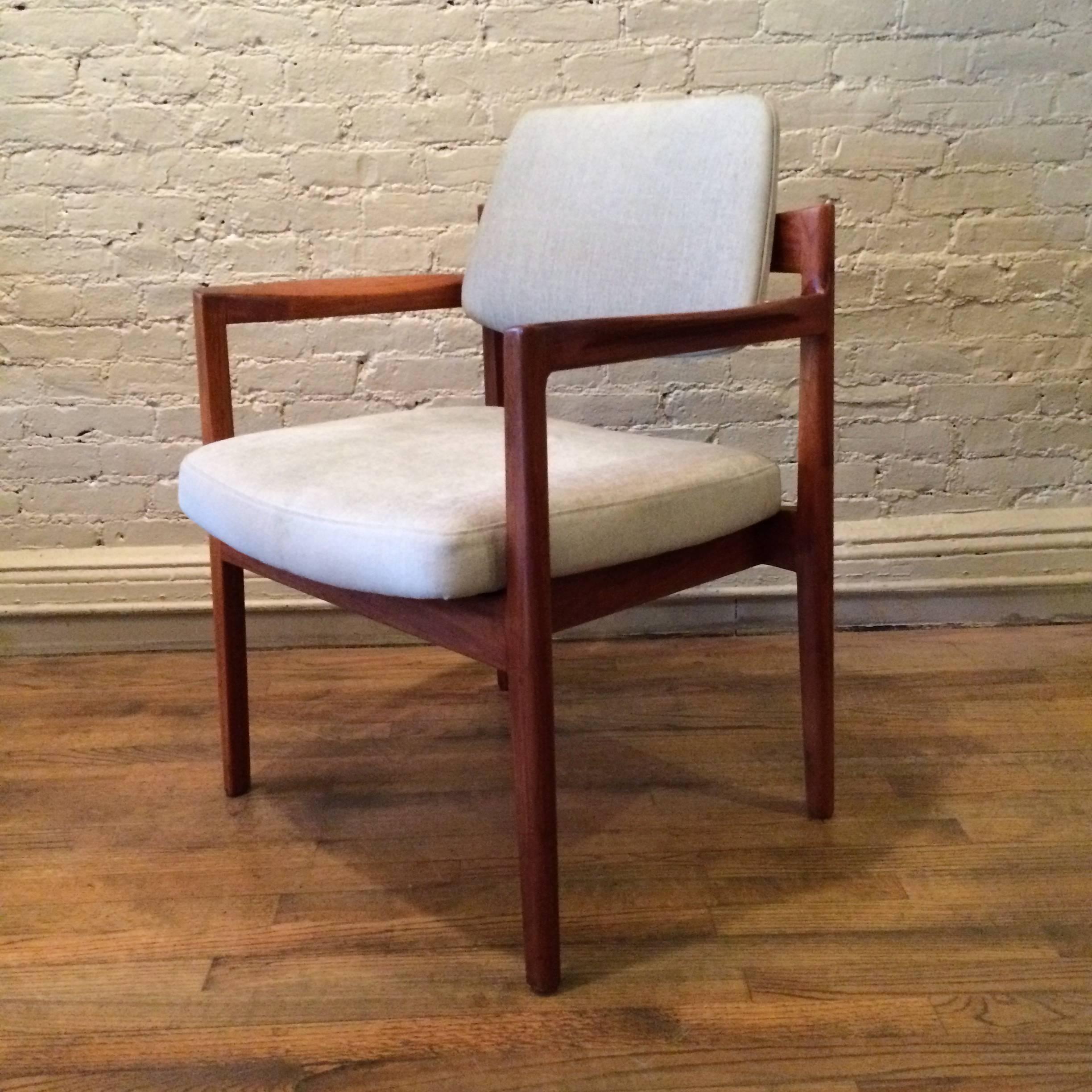 Mid-Century Modern, teak, upholstered armchair by Jens Risom is newly upholstered and finished.