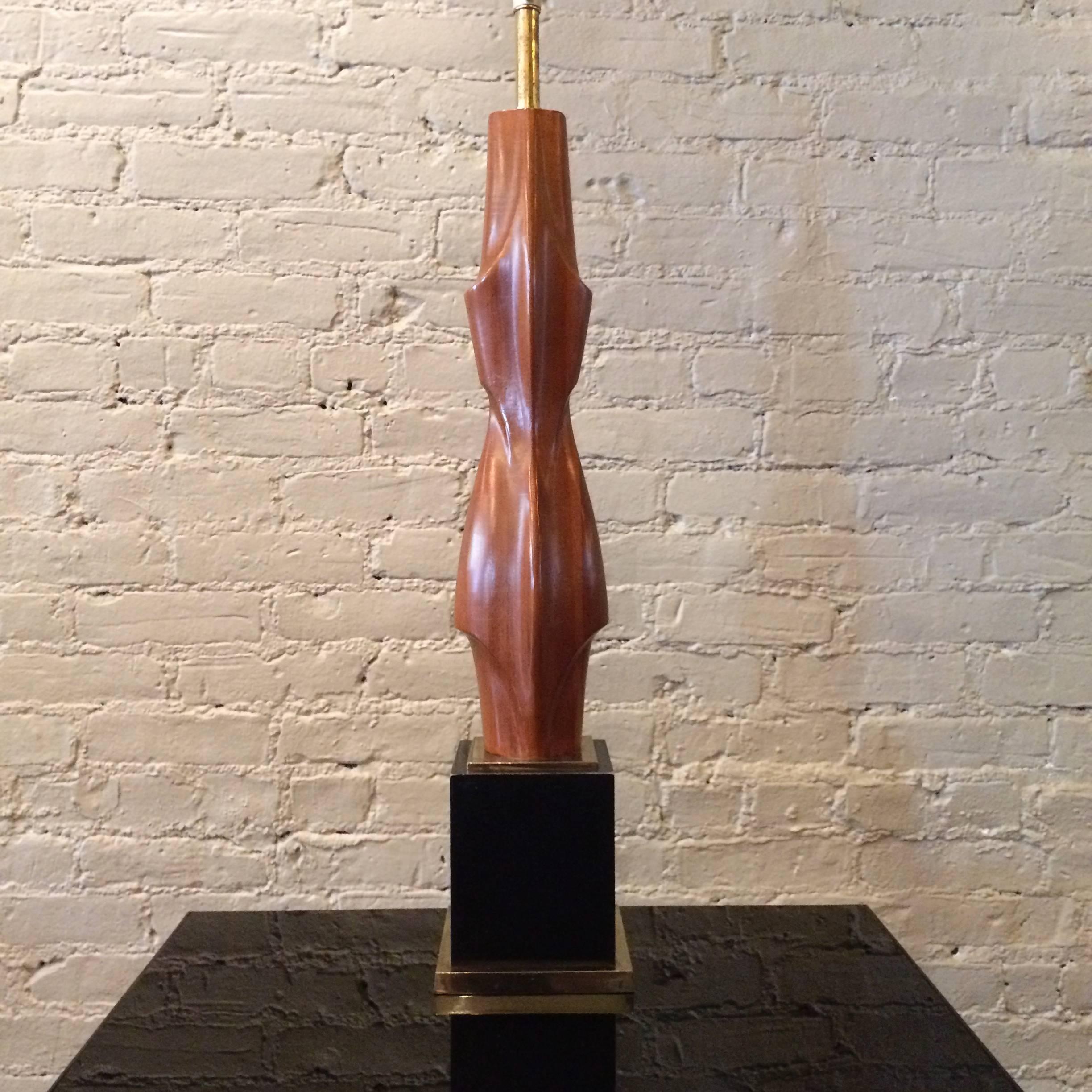 Tall, Mid-Century Modern, sculptural mahogany, table lamp with cast metal base by Laurel Lighting Co.

 