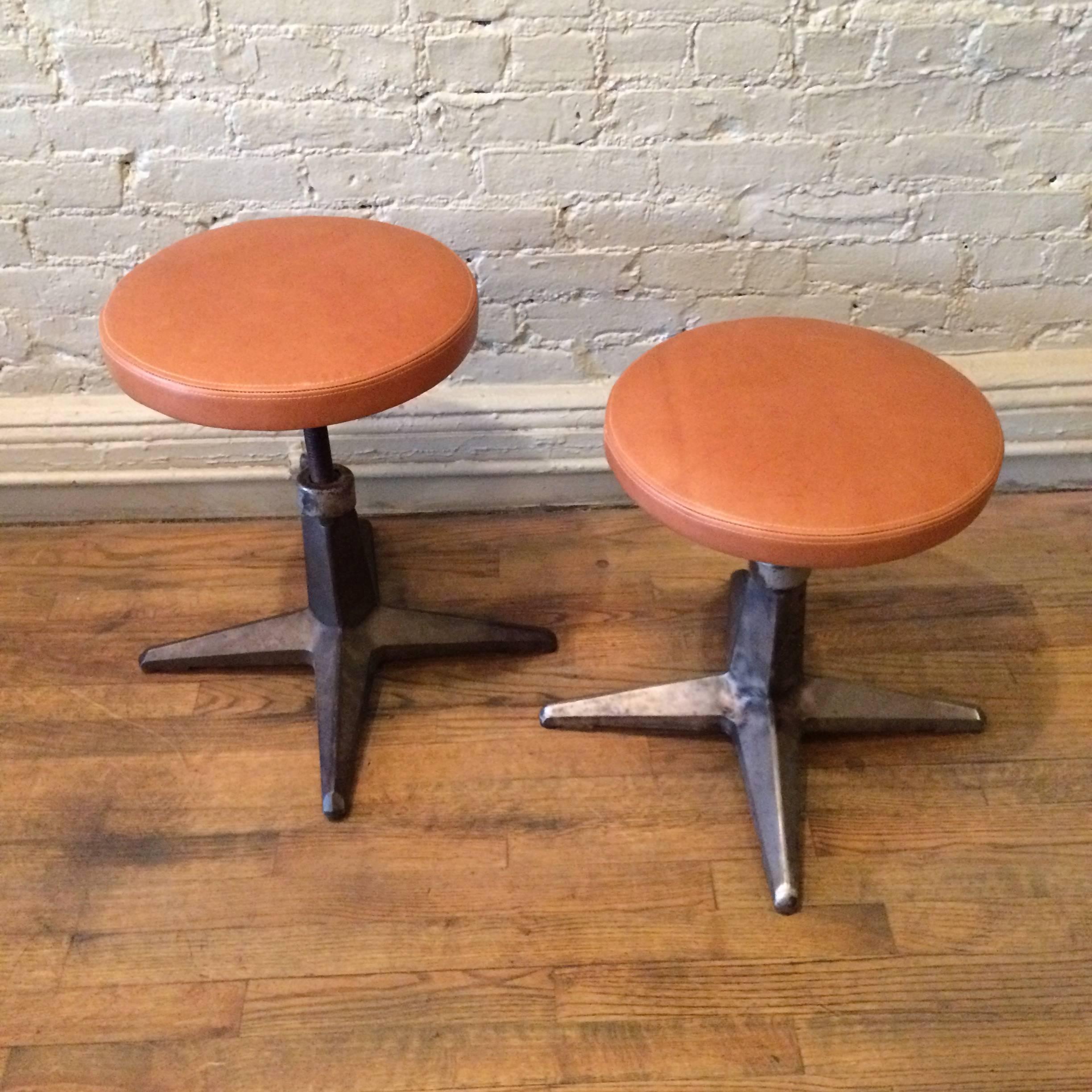 American Pair Of Industrial Cast Iron Adjustable Stools with Leather Seats