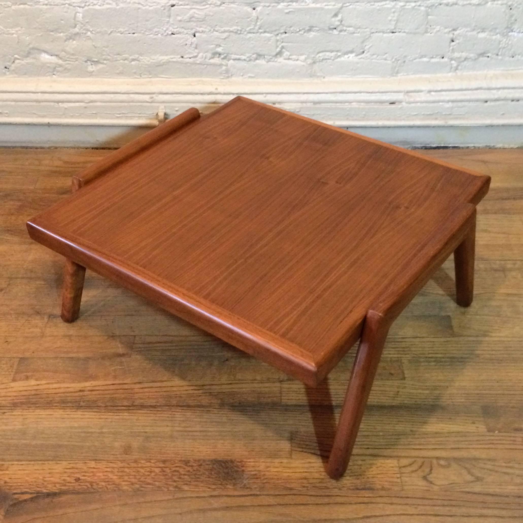 Low, square, walnut, American, Mid-Century Modern, side table with sleek, skewed legs.