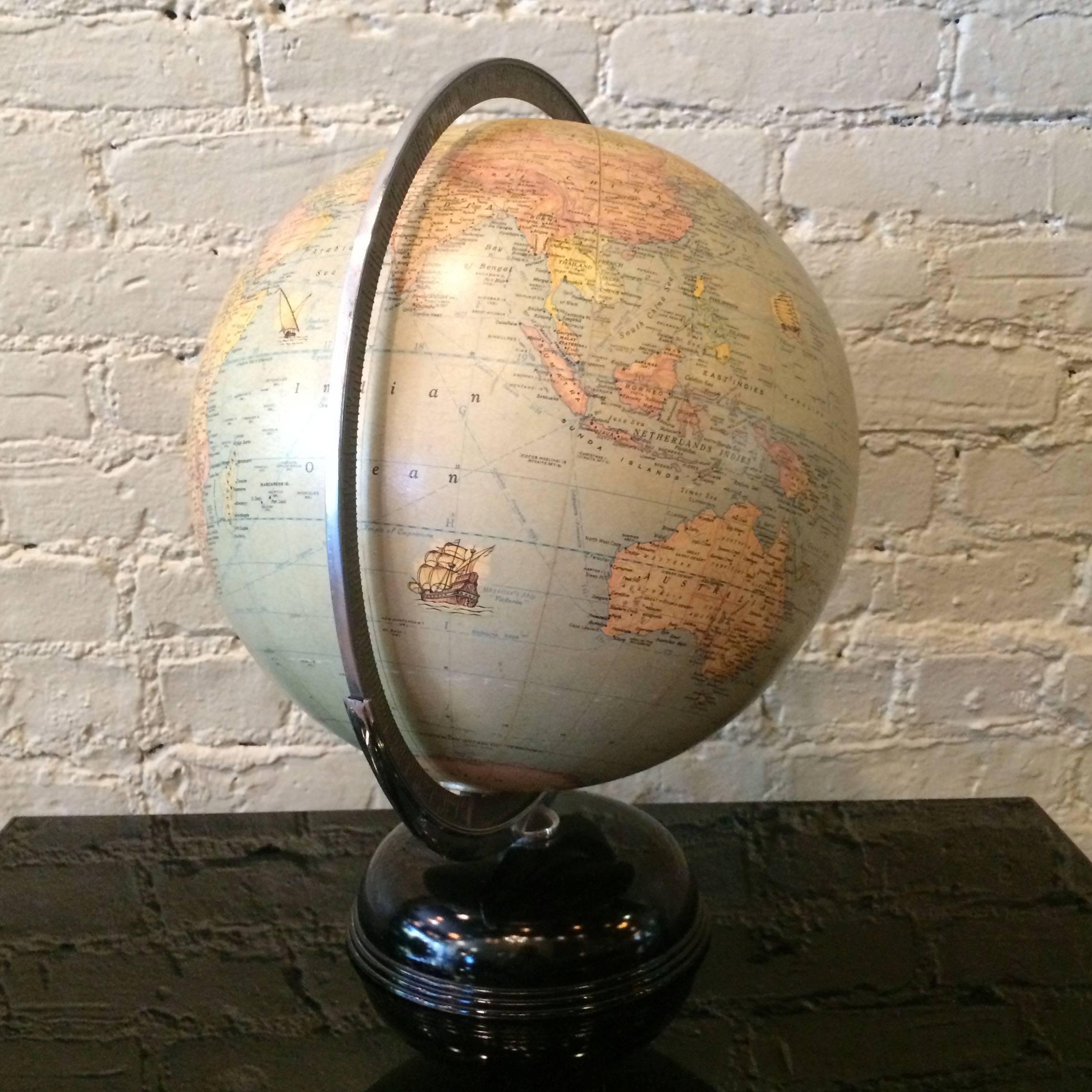 1930s, Art Deco, terrestrial art globe by Rand McNally & Co., Chicago with black glass base.