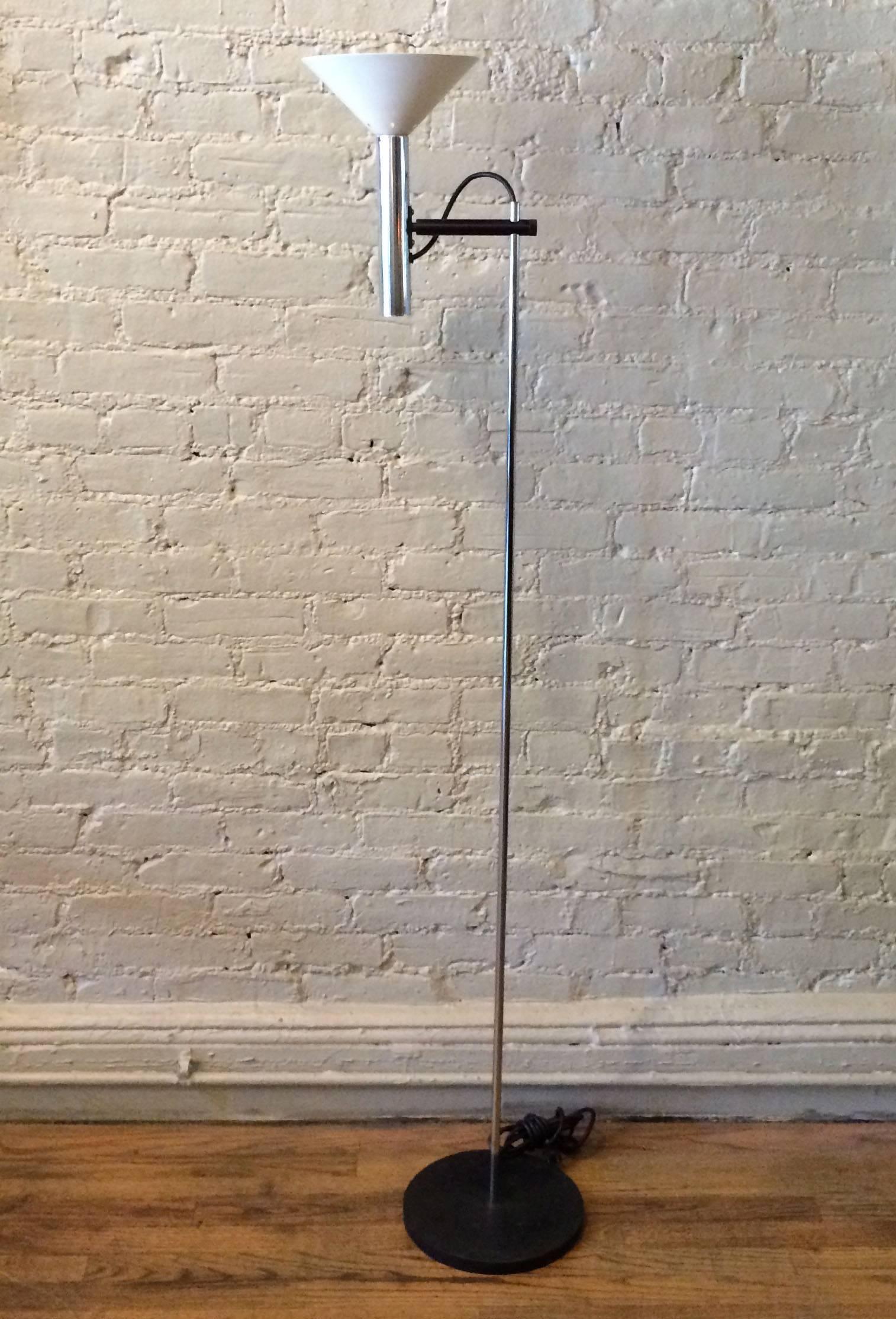 French, Mid-Century Modern, chrome, floor lamp with articulating cone shade that circulates 360 degrees in the style of Stilnovo or Pierre Guariche.