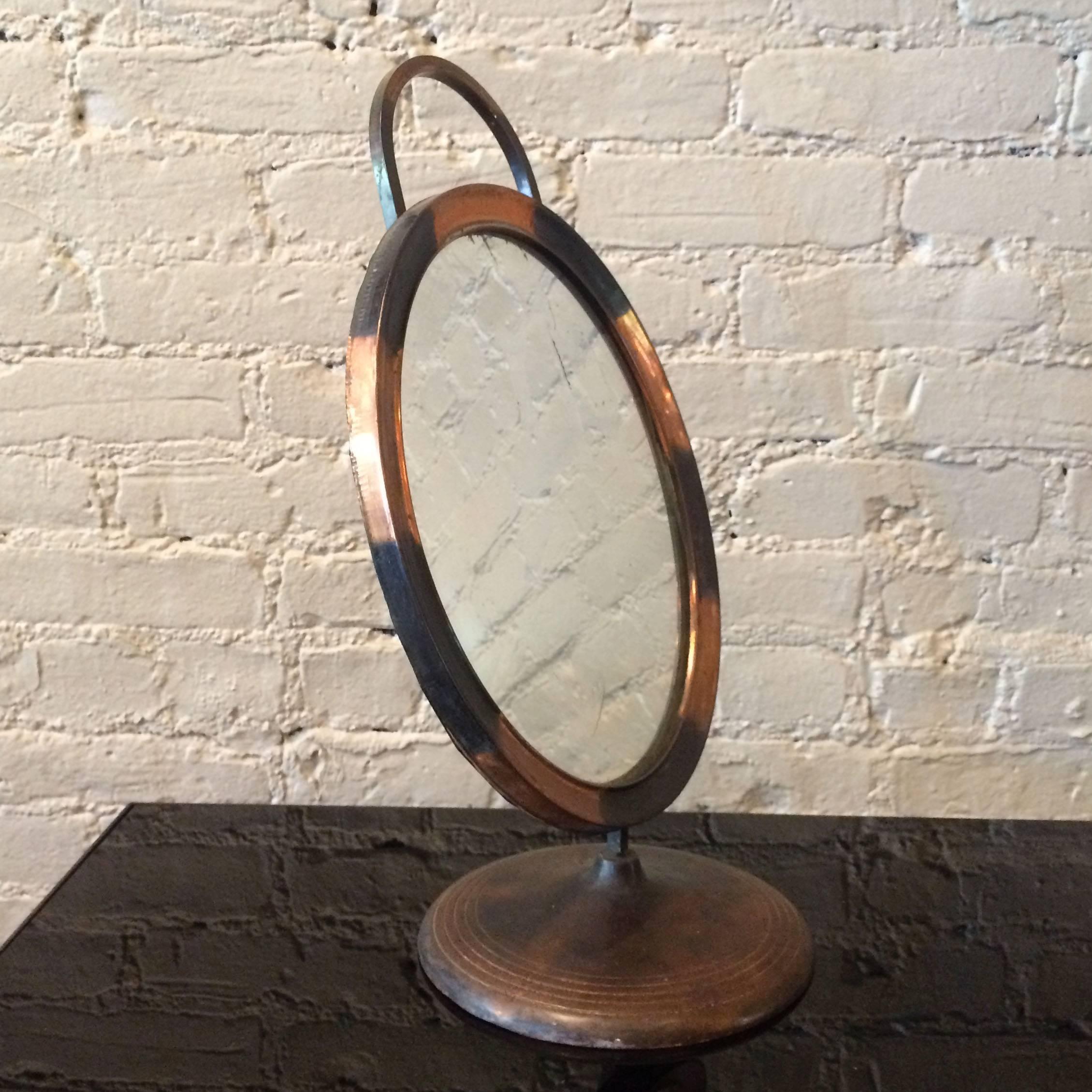 Art Deco, 1930s, Japanned copper, fixed tilt, oval vanity / shaving / table-top mirror.
