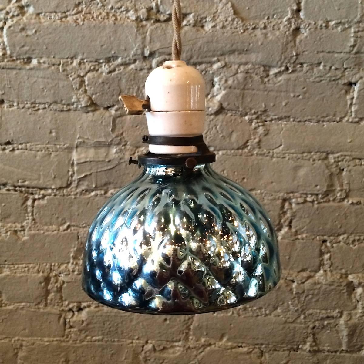 Petite, deep blue quilted mercury glass pendant light with porcelain turnkey fitter is newly wired with braided cord and able to take bulbs up to 200 watts.