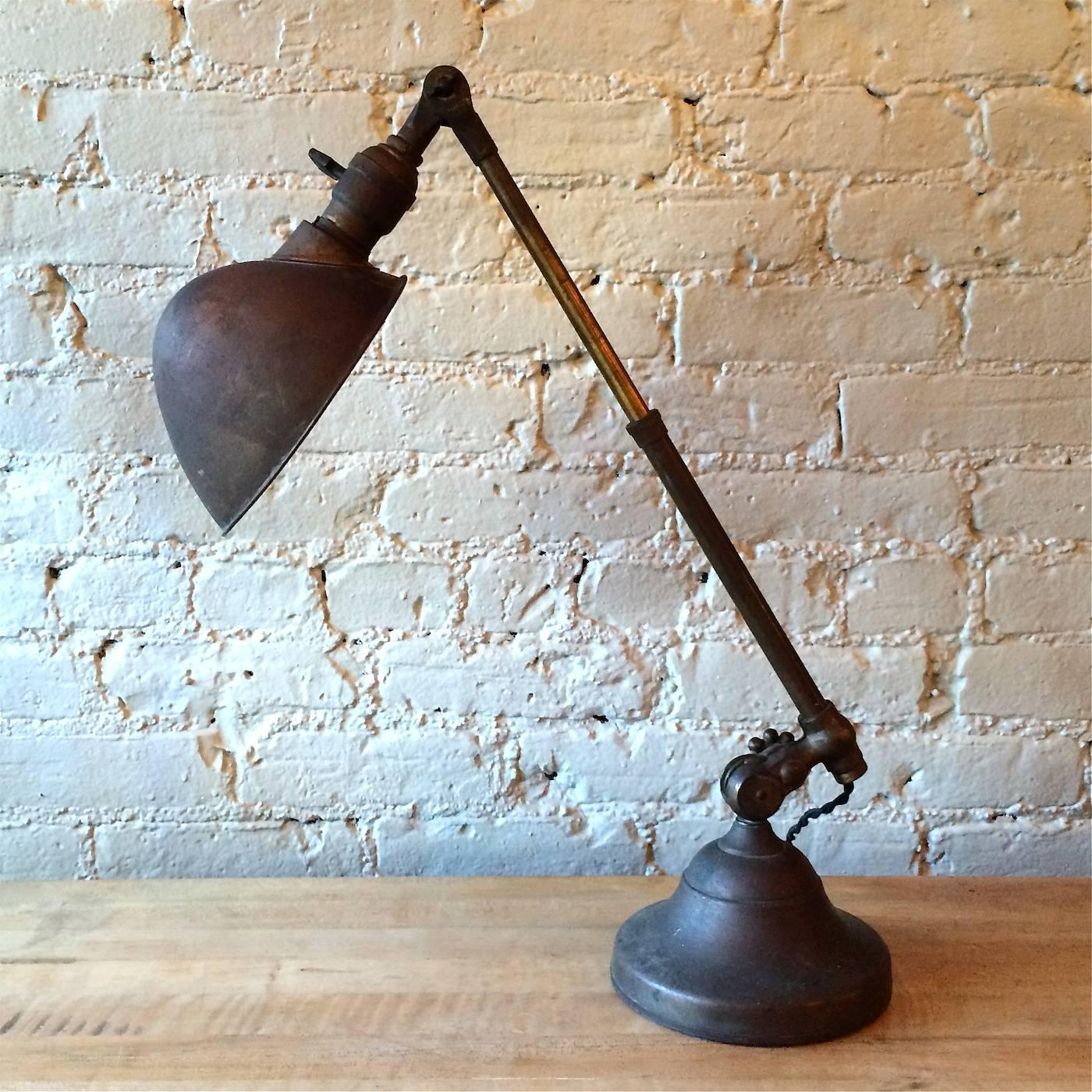 Antique late 19th century Industrial factory brass task lamp by O.C. White, with adjustable telescopic arm that extends from 15