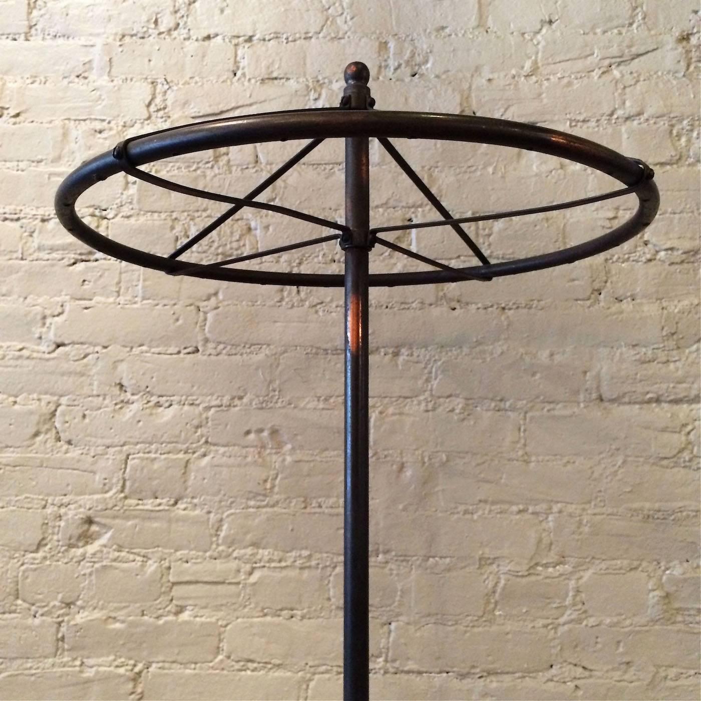 Rare Early 20th Century Industrial Japanned Steel Lingerie Rounder Rack In Good Condition In Brooklyn, NY