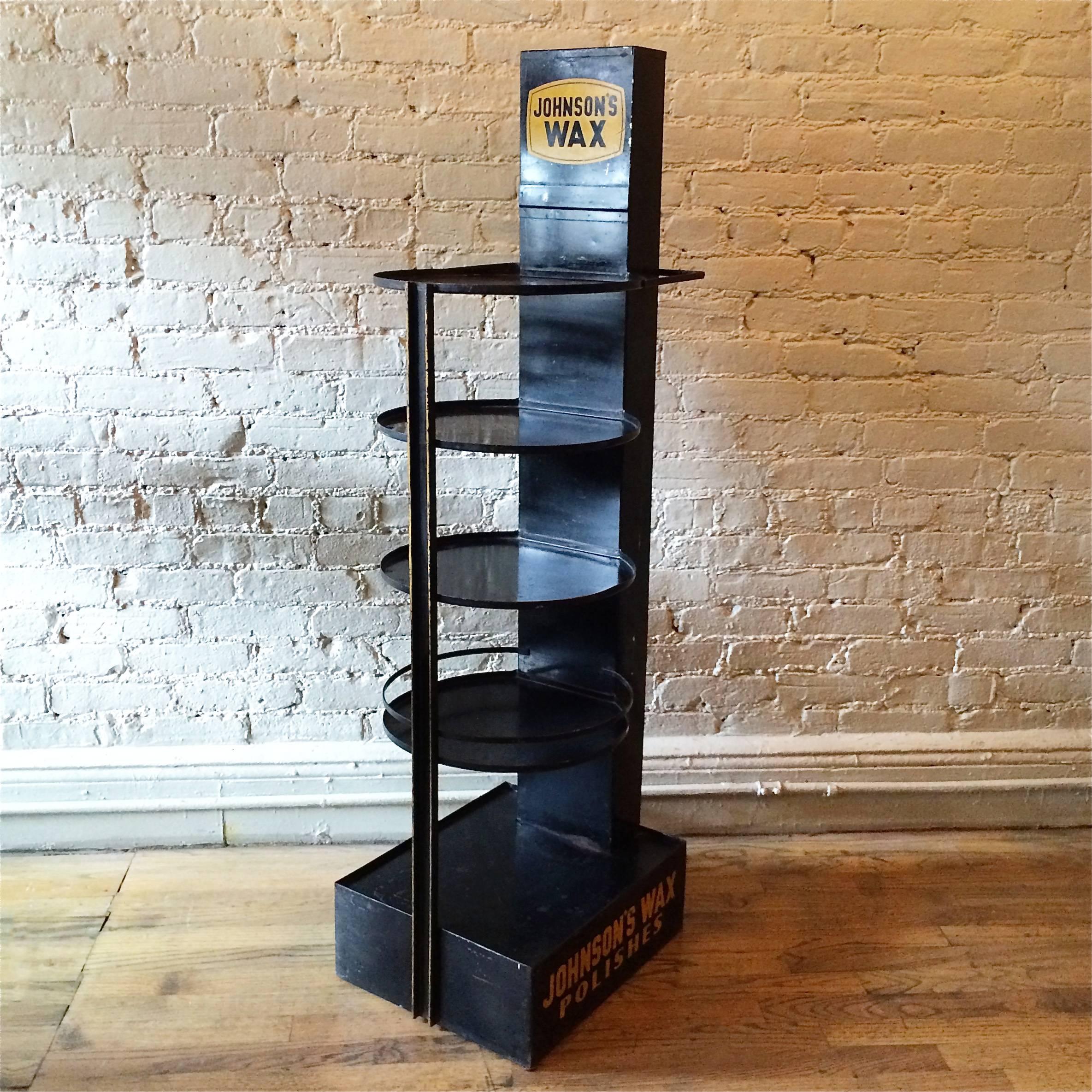 Painted metal, four-tier advertising display stand for Johnson's wax polishes is an excellent example of American modernist esthetic.