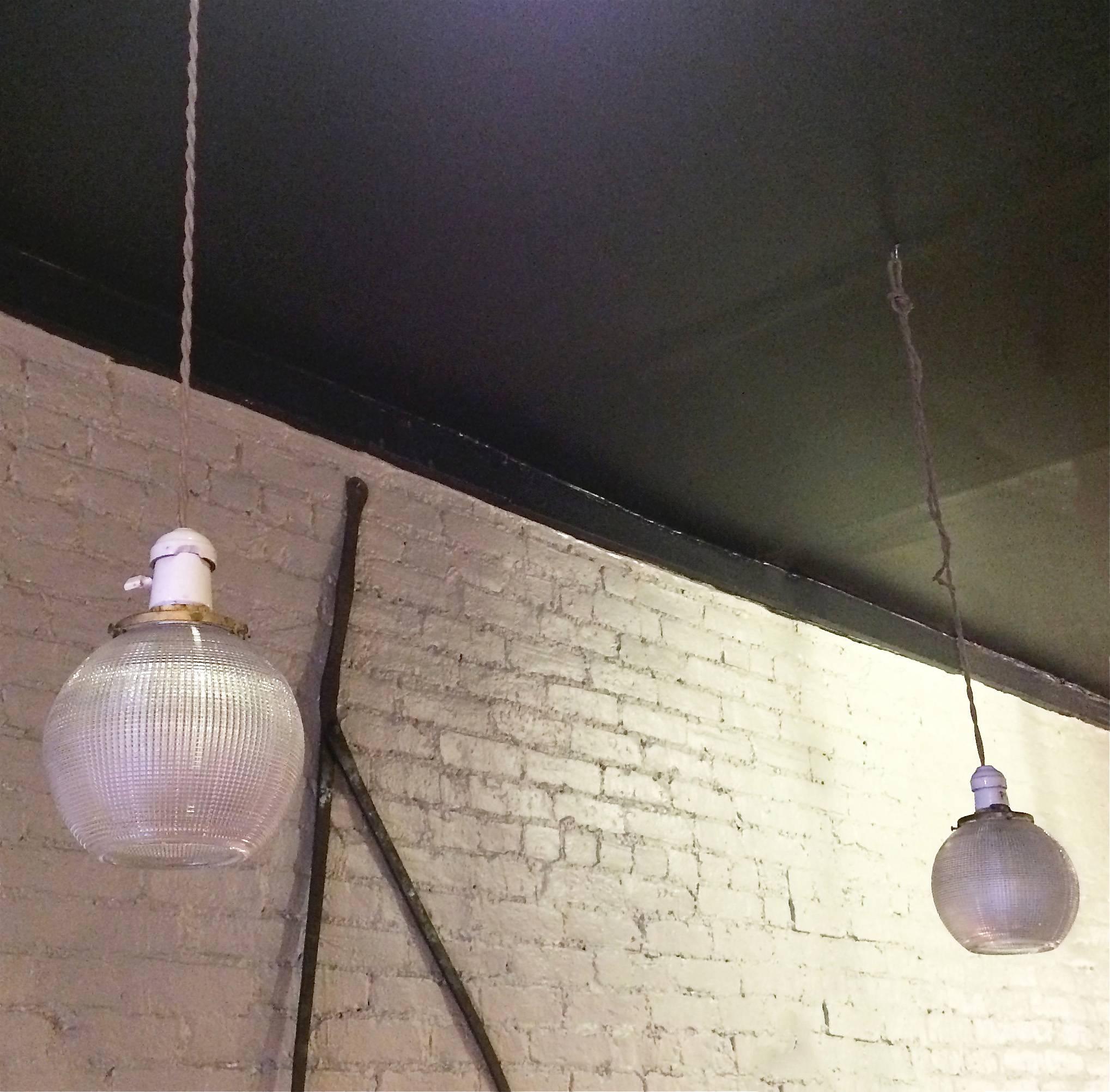 Industrial Pair of Holophane Glass Open Globe Pendant Lights