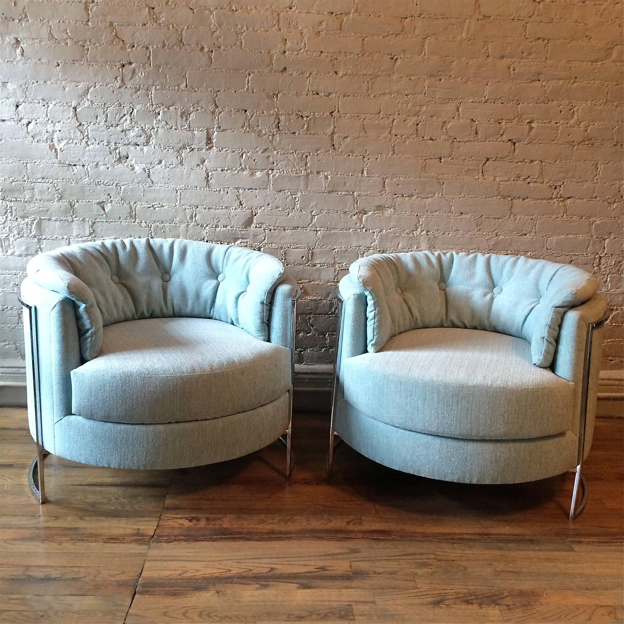 Pair of incredible, barrel shape, club, lounge chairs with minimal chrome frames are newly upholstered in light blue chenille.