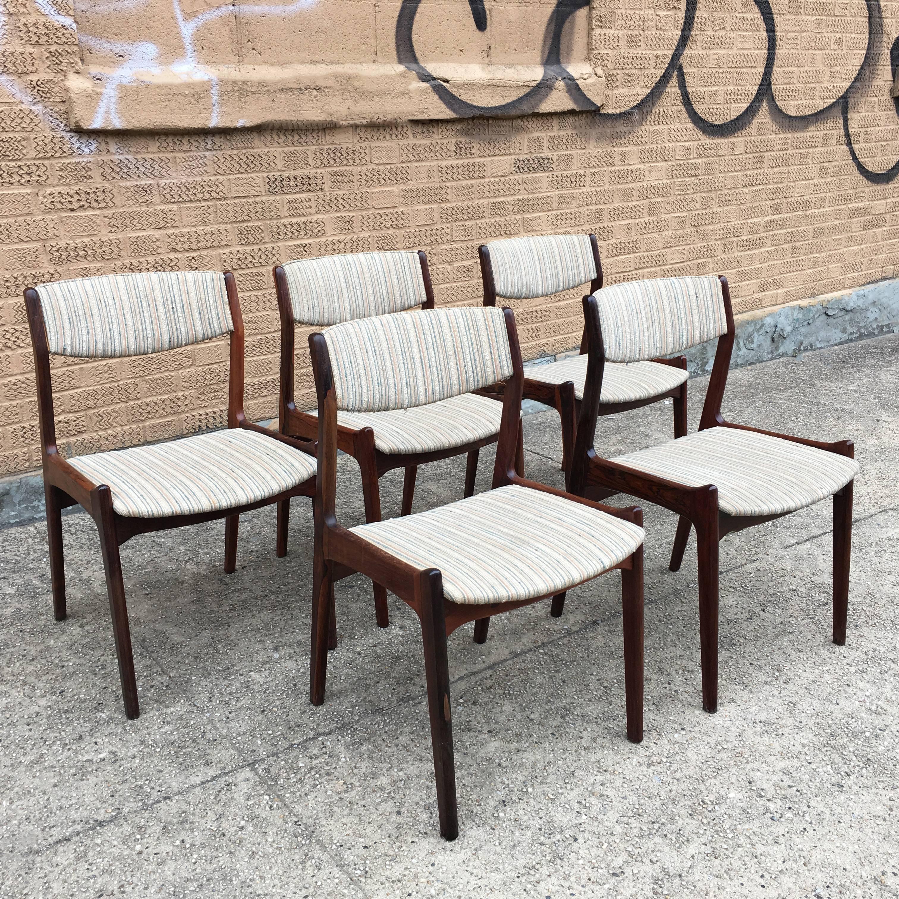 Set of five, elegant, Danish modern, rosewood dining chairs with upholstered seats and backs by Eric Buck.
