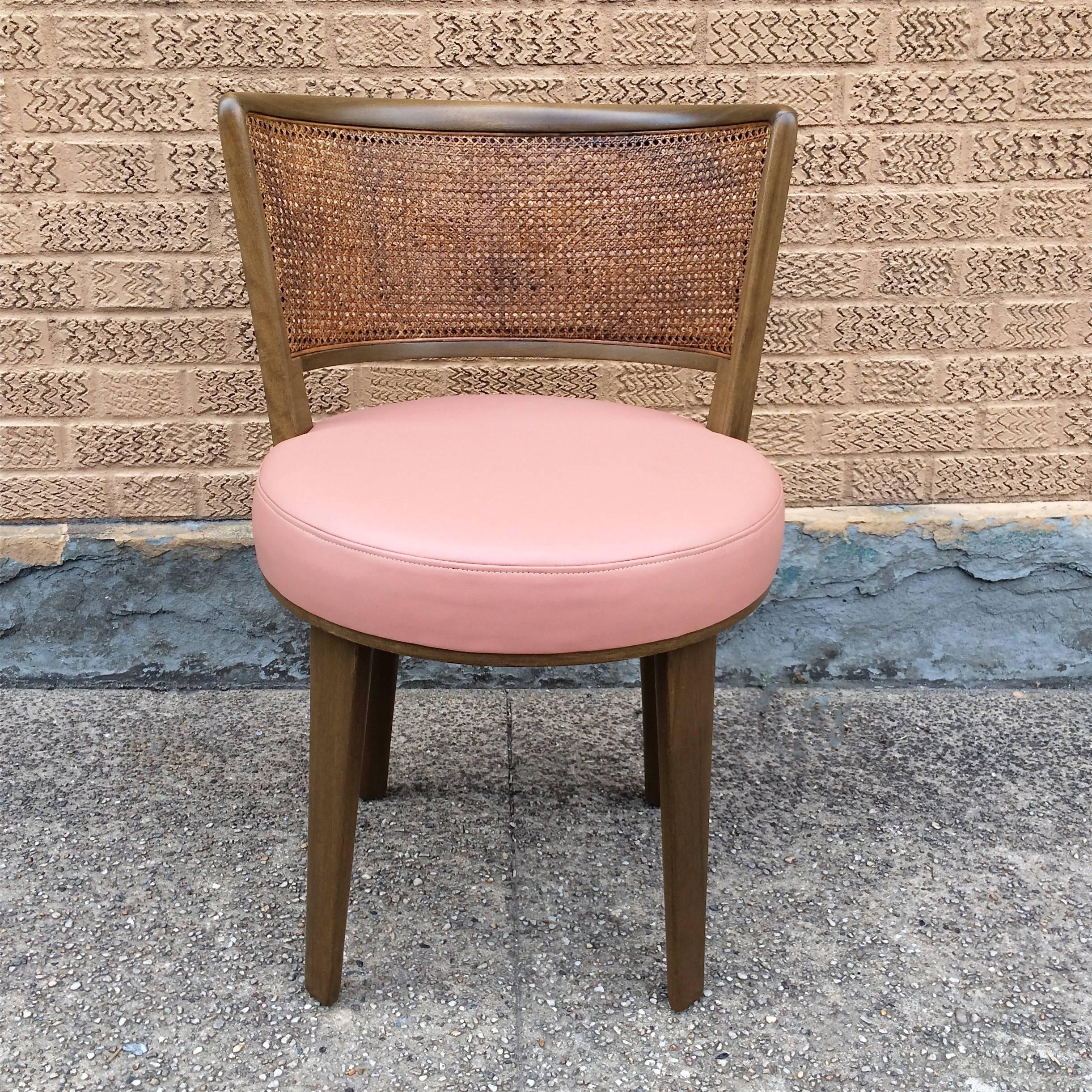 Mid-Century Modern, pickled mahogany vanity chair by Edward Warmly for Dunbar with caned back and blush pink leather upholstered seat.