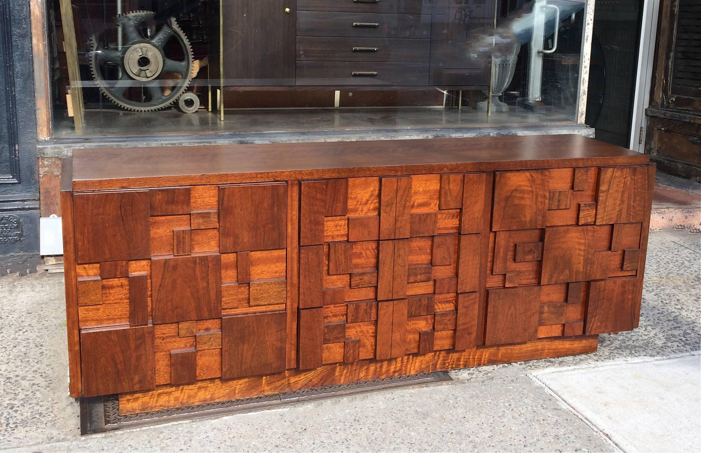 Impressive, Mid-Century Modern, long walnut dresser with nine hidden drawers from the Brutalist Mosaic design series by Altavista Lane is newly restored.