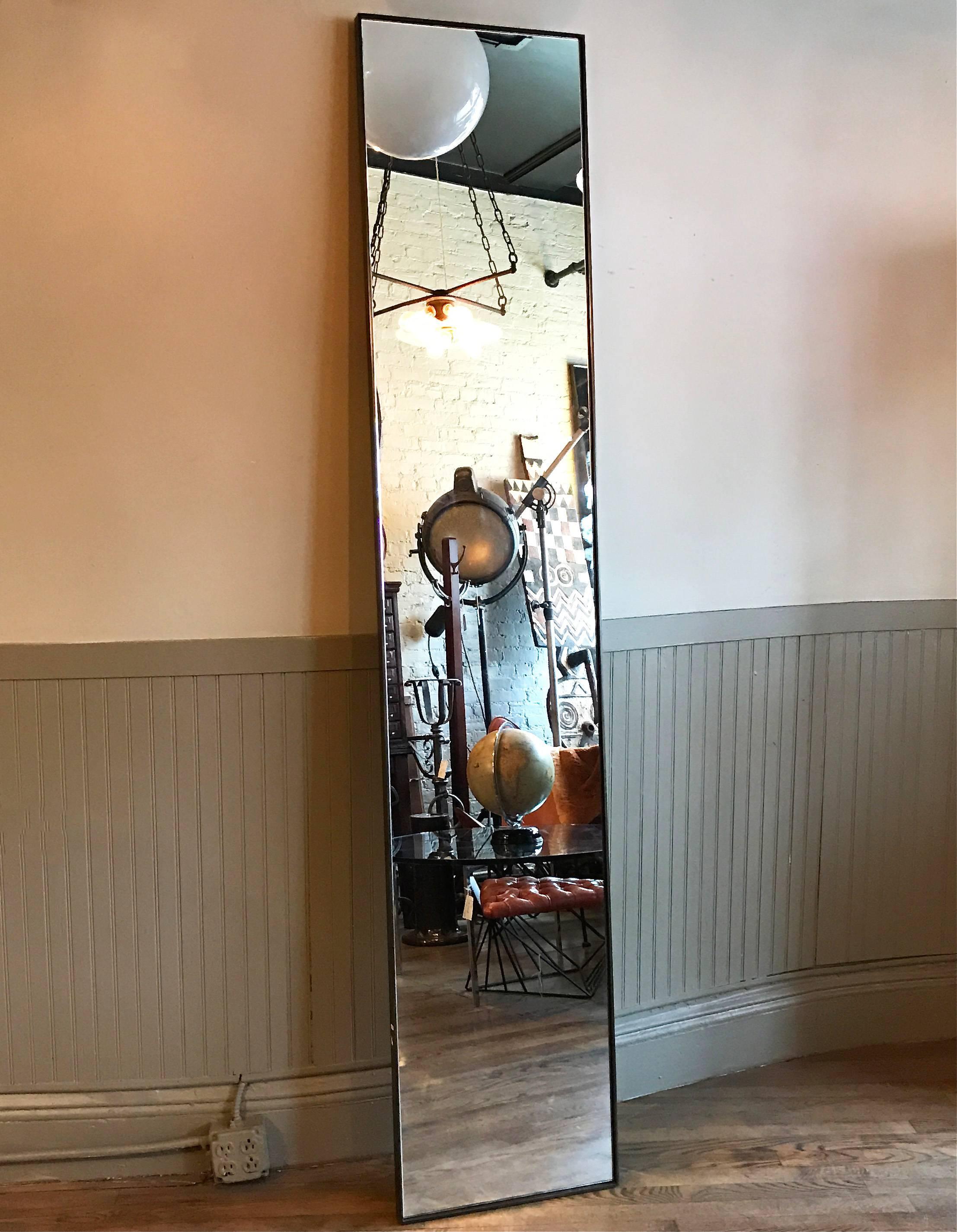 Tall, slender, contemporary, full length mirror with bronzed finish, steel frame. Craftsman made for a custom project.