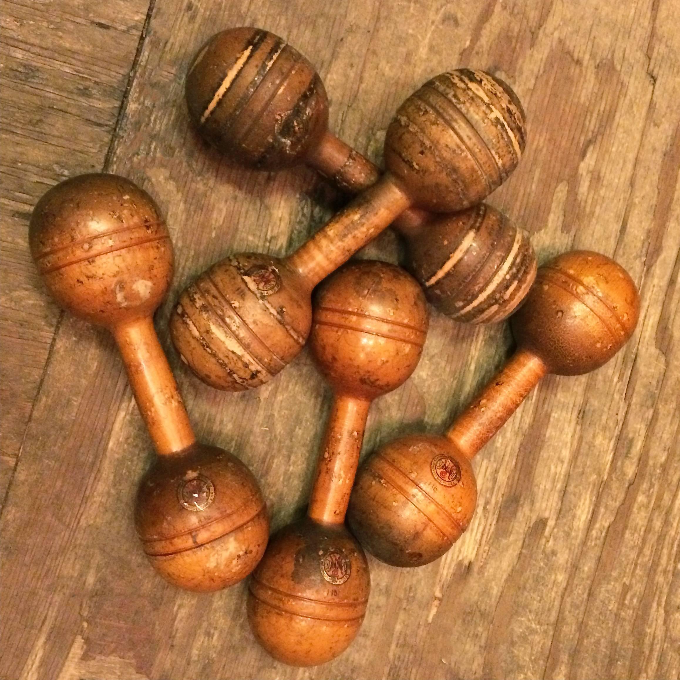 1lb, maple, dumbbell, hand weights by Standard can be cleaned up to a degree but look great sporting their original well-worn patina. Seven pairs available.
