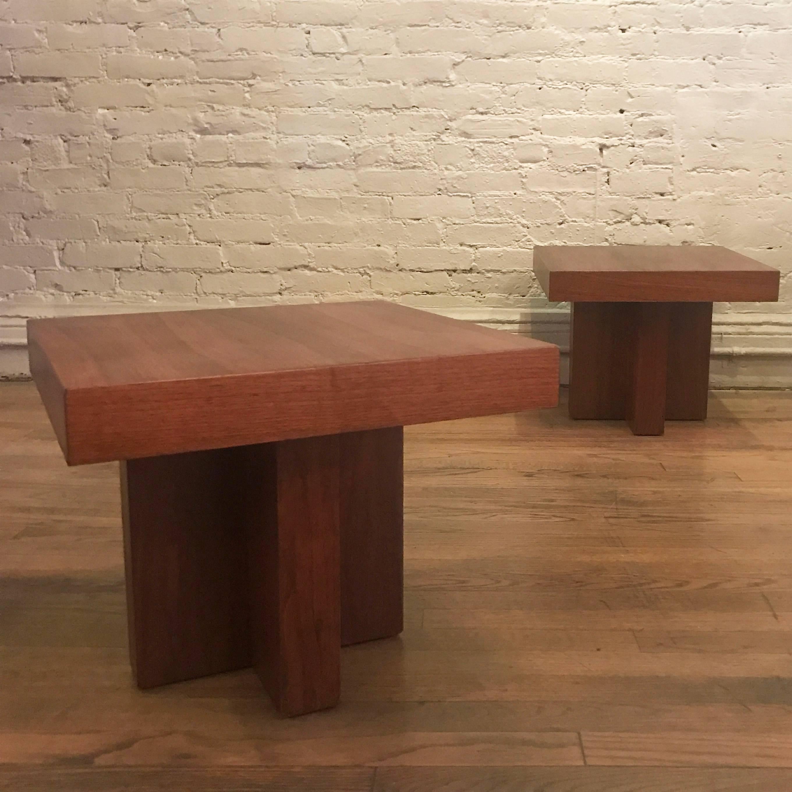 Pair of Milo Baughman, Model 1922, walnut, side tables feature incredibly proportioned 2.5″ thick X bases with 2.5″ thick tops. The tables can also be used together as a coffee table.