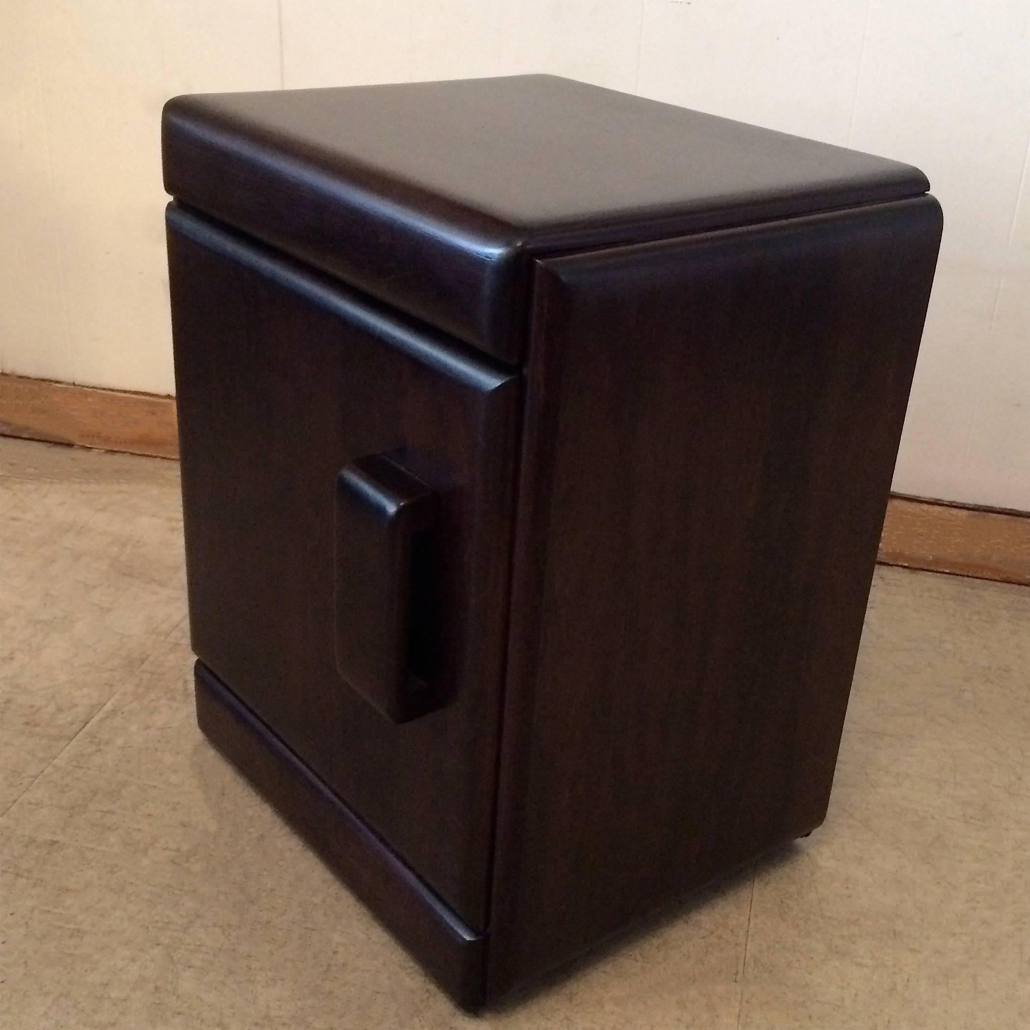 Mid-Century Modern, ebonized maple, nightstand or end table by Russel Wright. Interior includes one adjustable shelf.