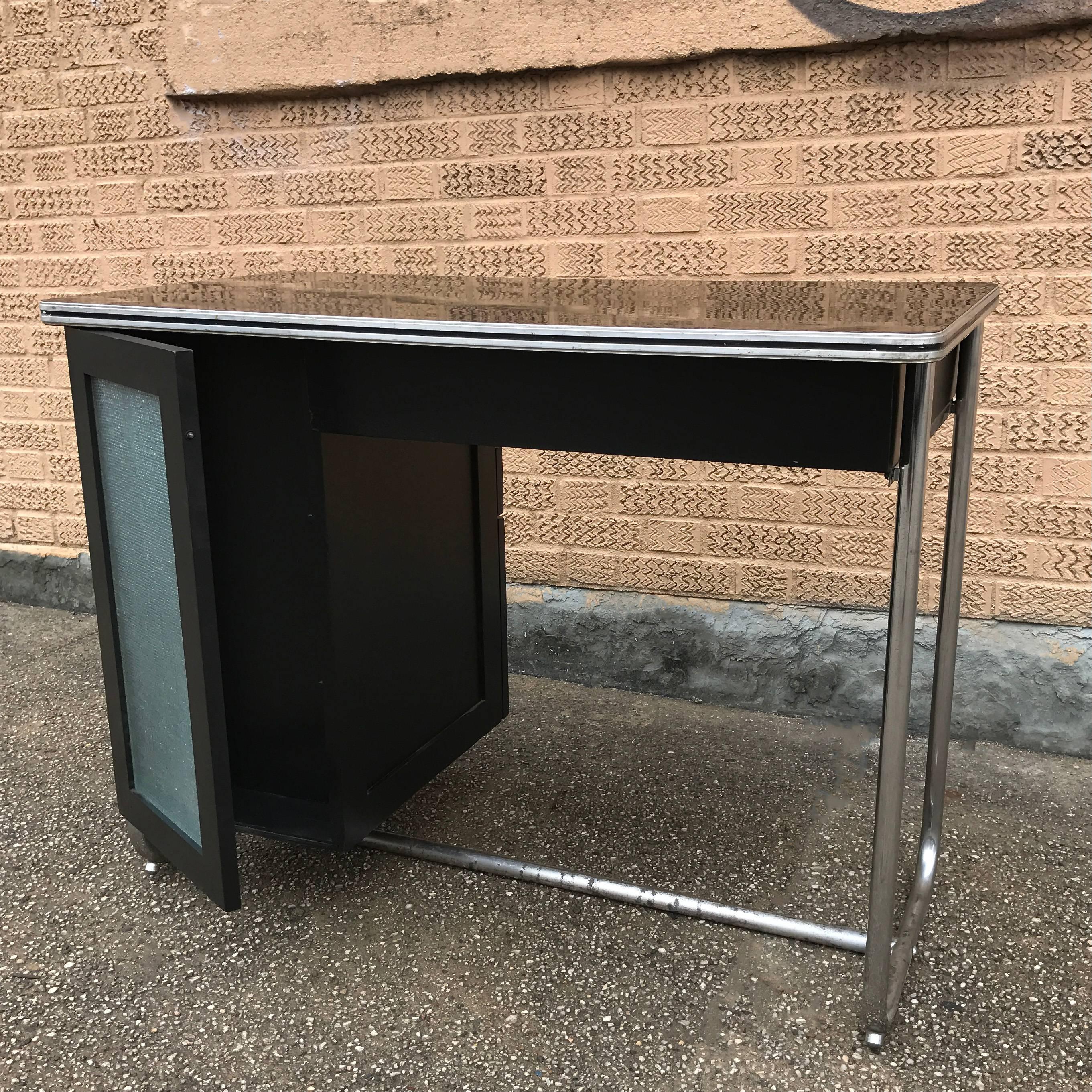 American Art Deco Tubular Chrome And Laminate Desk by Gilbert Rohde