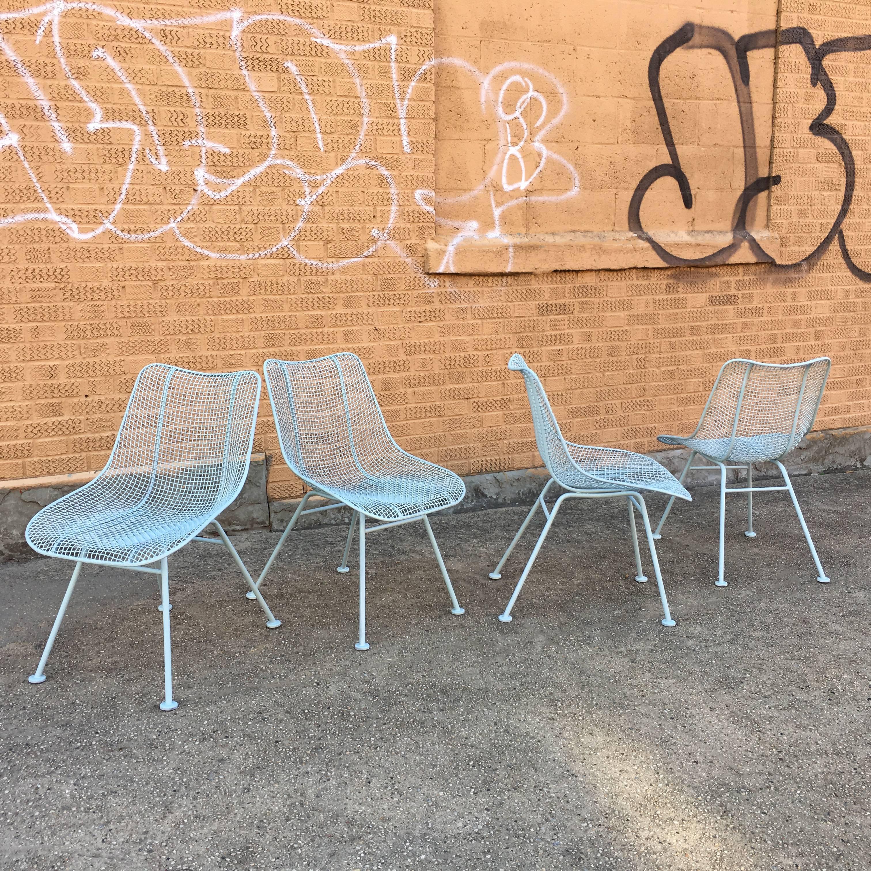Set of six, wrought iron, patio, dining Sculptura chairs by Russell Woodard newly finished in matte powder blue.