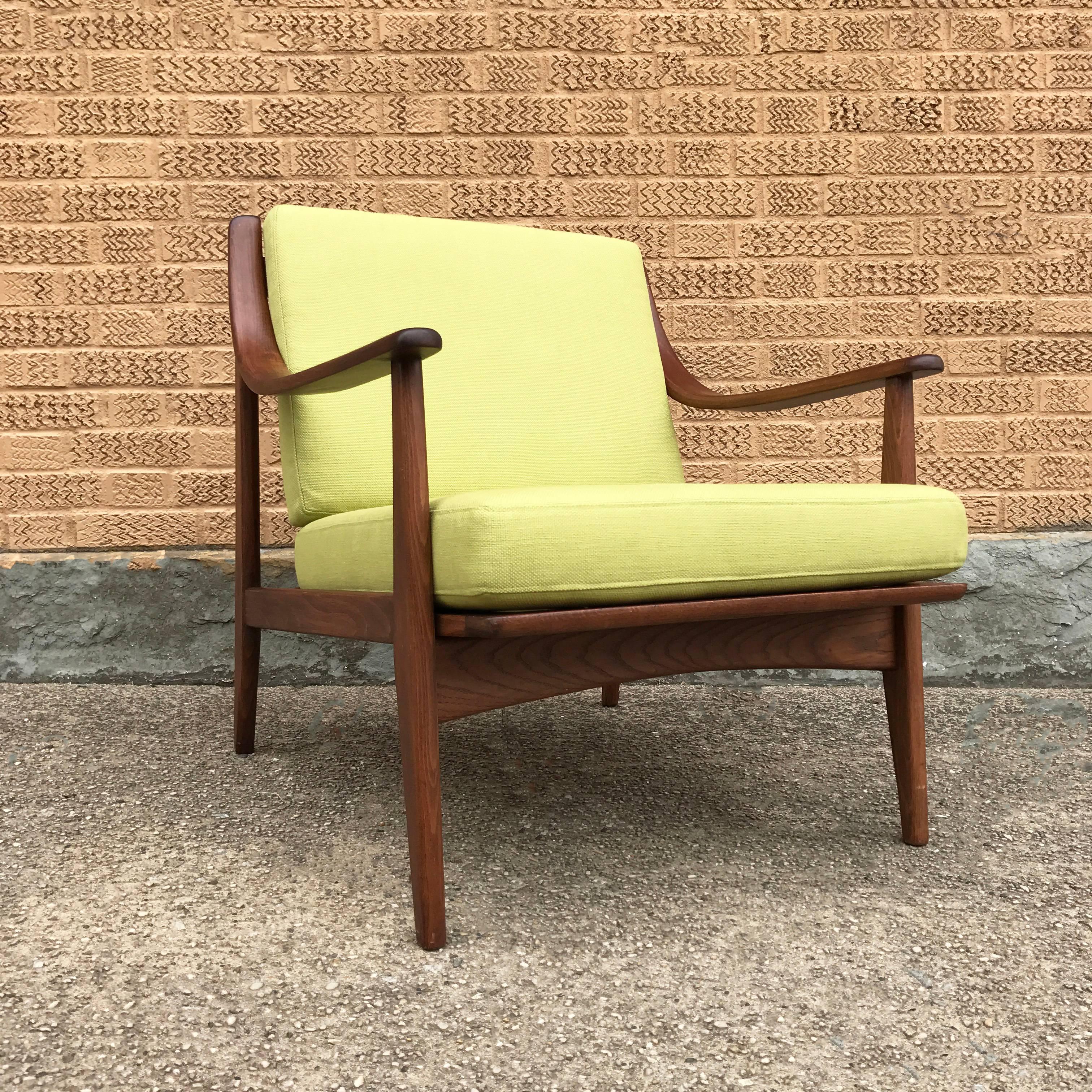 Low profile, Danish modern, teak lounge chair by Peter Hvidt & Orla Mølgaard Nielsen featuring scoop arms is newly finished and upholstered in a chartreuse cotton blend.