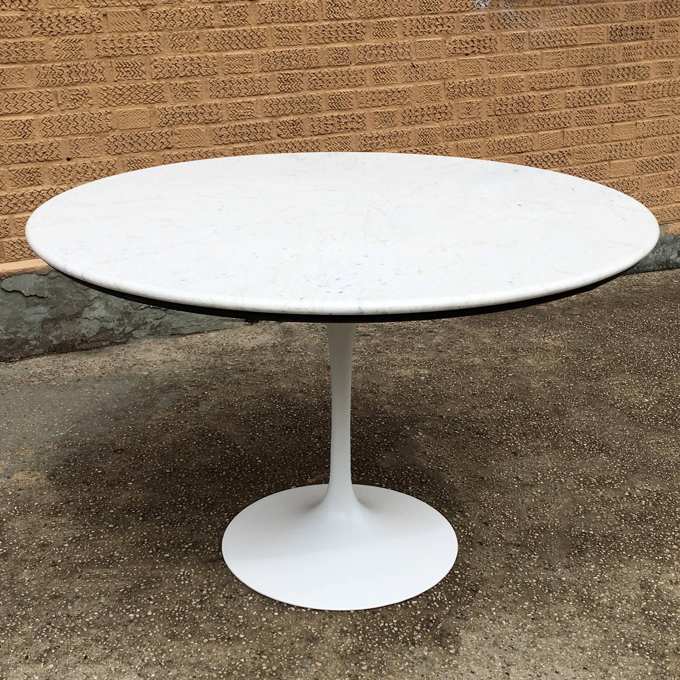 Mid-Century Modern, dining table features a newly painted, Eero Saarinen, white tulip pedestal base and a 45