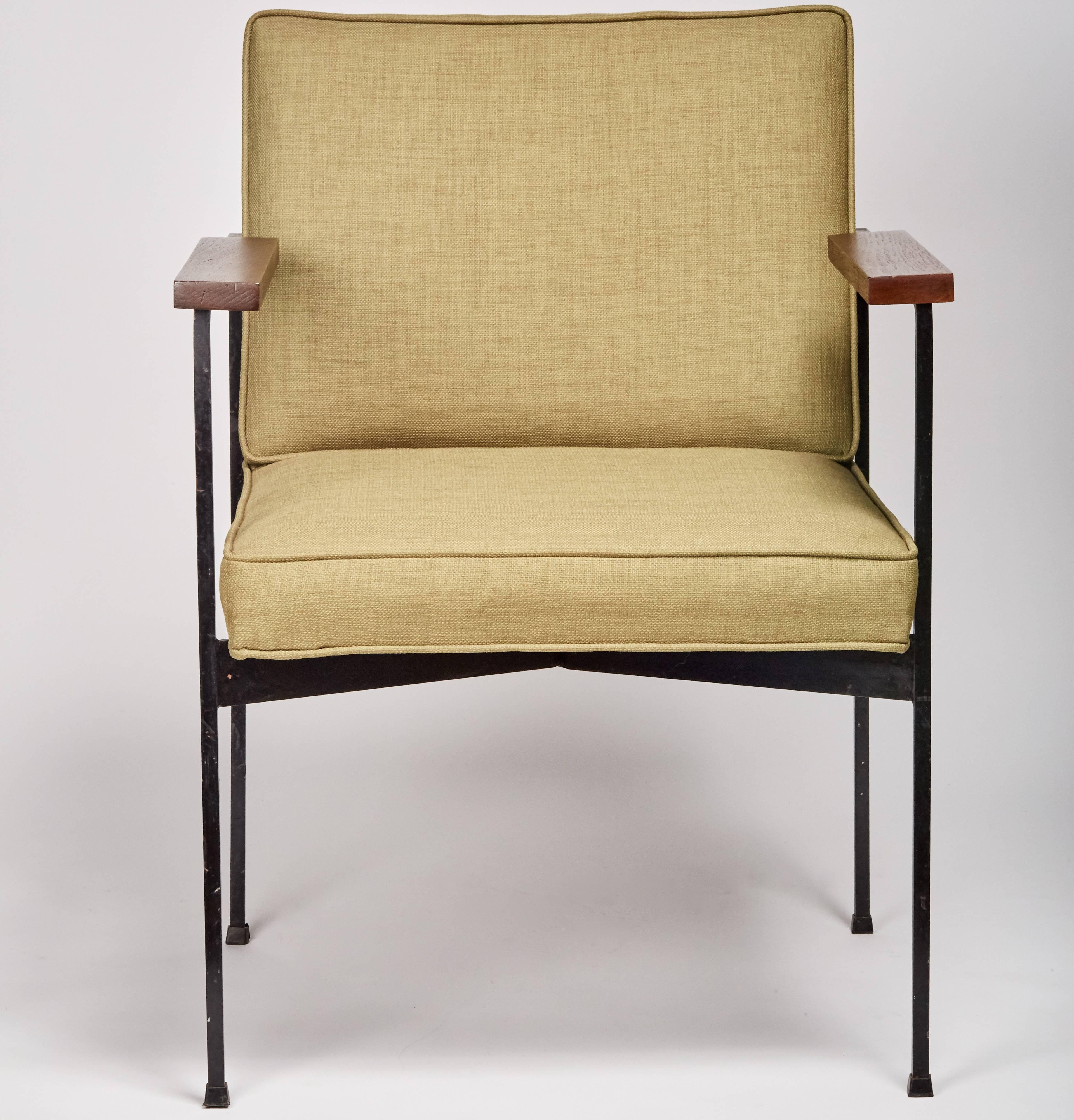 Mid-Century Modern, armchair by Pacific Iron attributed to Milo Baughman features solid walnut armrests and newly upholstery in light green cotton linen blend.