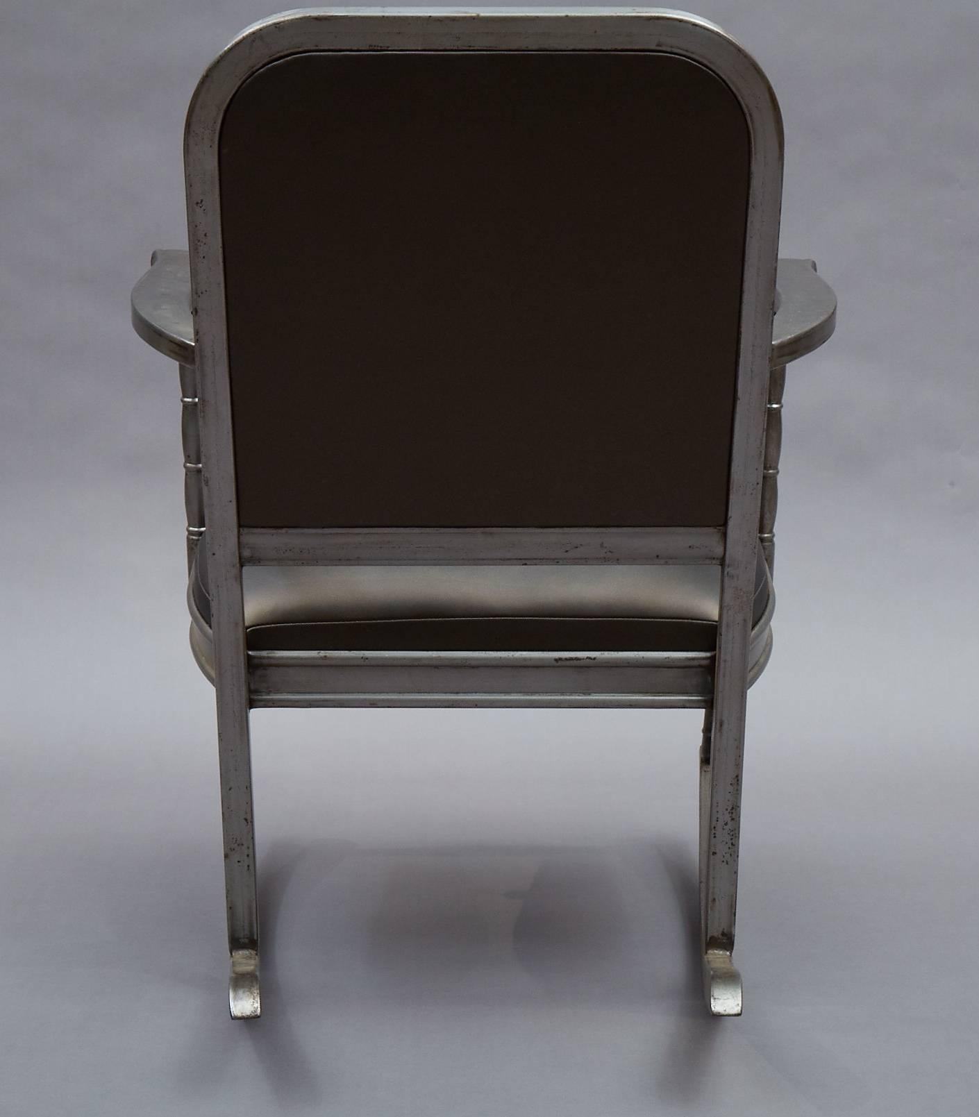 American Simmons Brushed Steel and Gunmetal Vinyl Rocking Chair For Sale