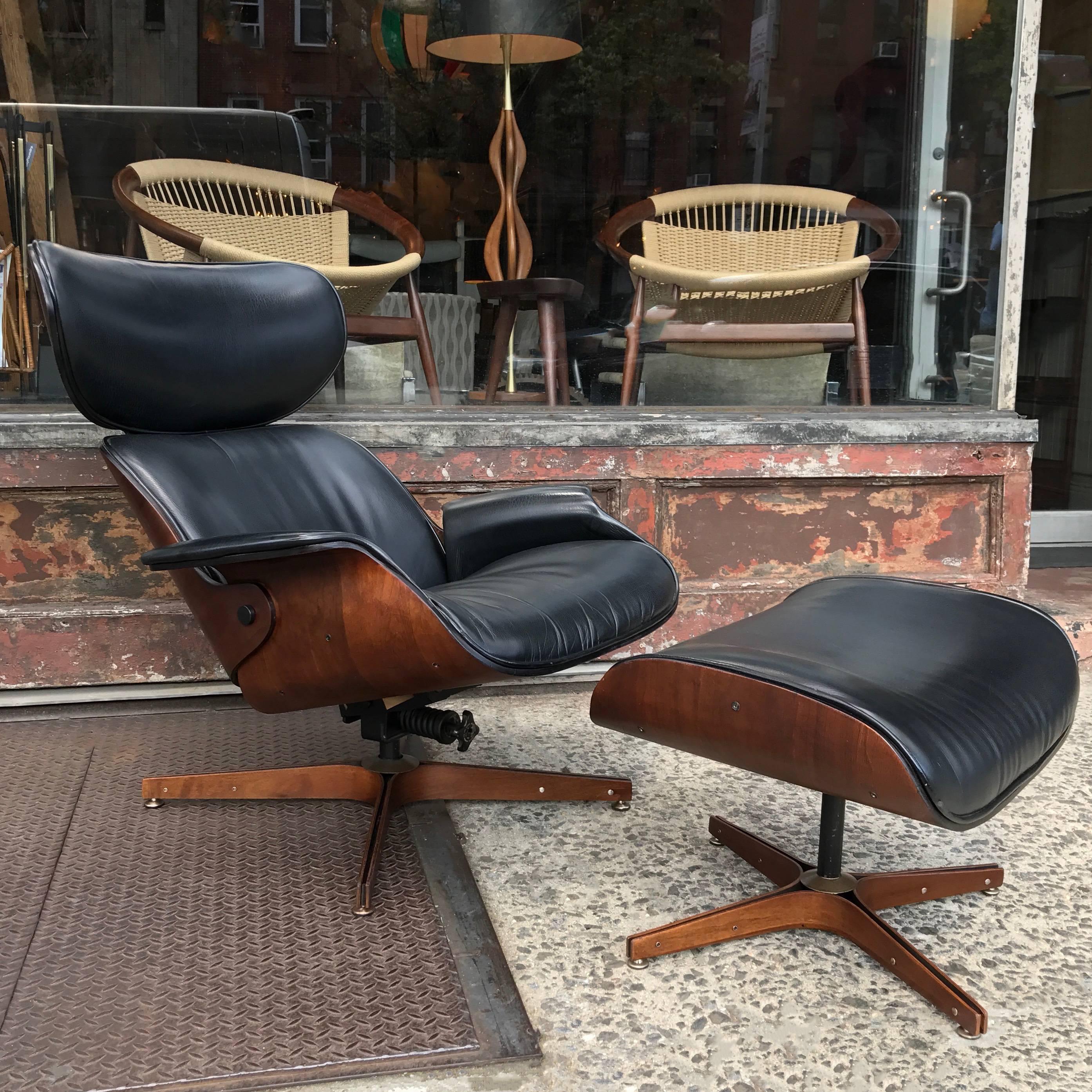 Classic, Mid-Century Modern, swivel, reclining lounge chair with matching ottoman by George Mulhauser for Plycraft Associates. “Mr. Chair” features a molded, English walnut shell with black leather upholstery.

Ottoman: 24in W x 20in D x 16in H.