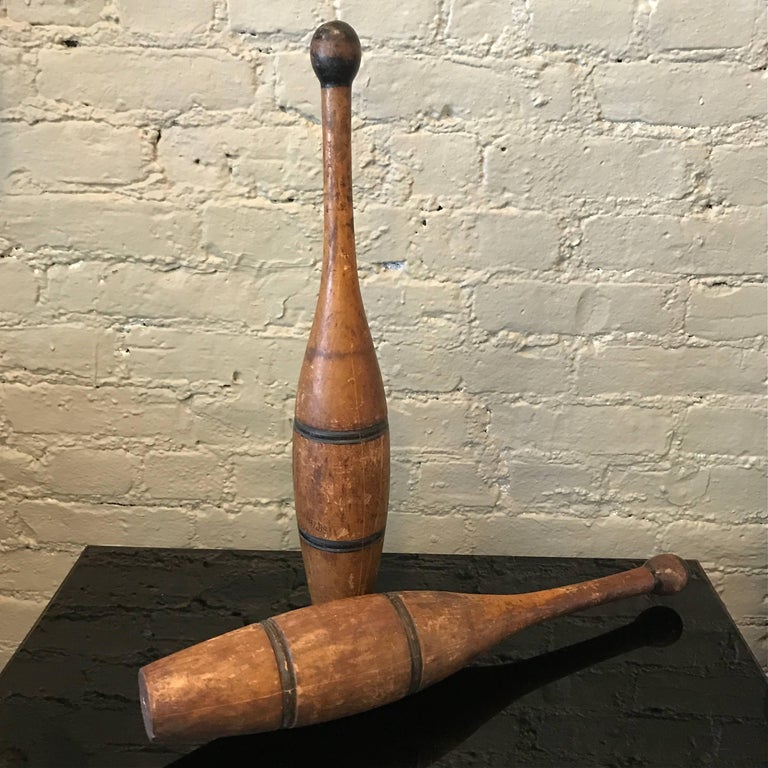 Pair of Patinated Maple Juggling Pins For Sale at 1stDibs