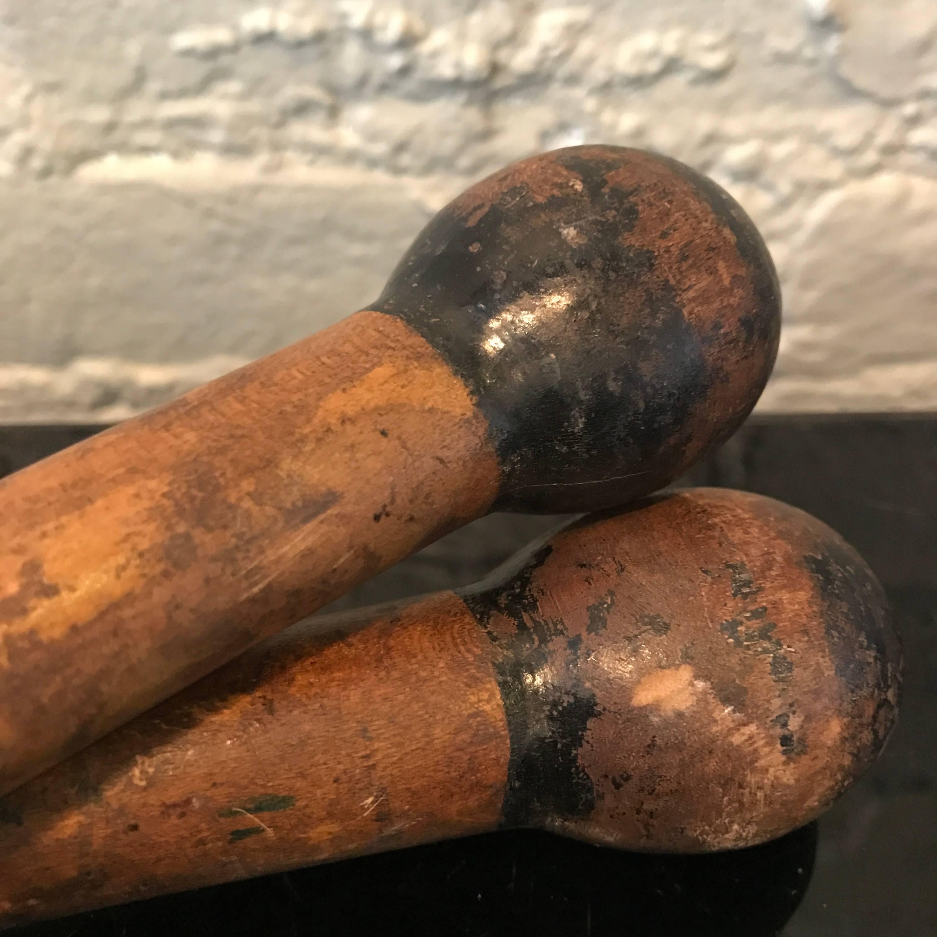 Turned Pair of Patinated Maple Juggling Pins
