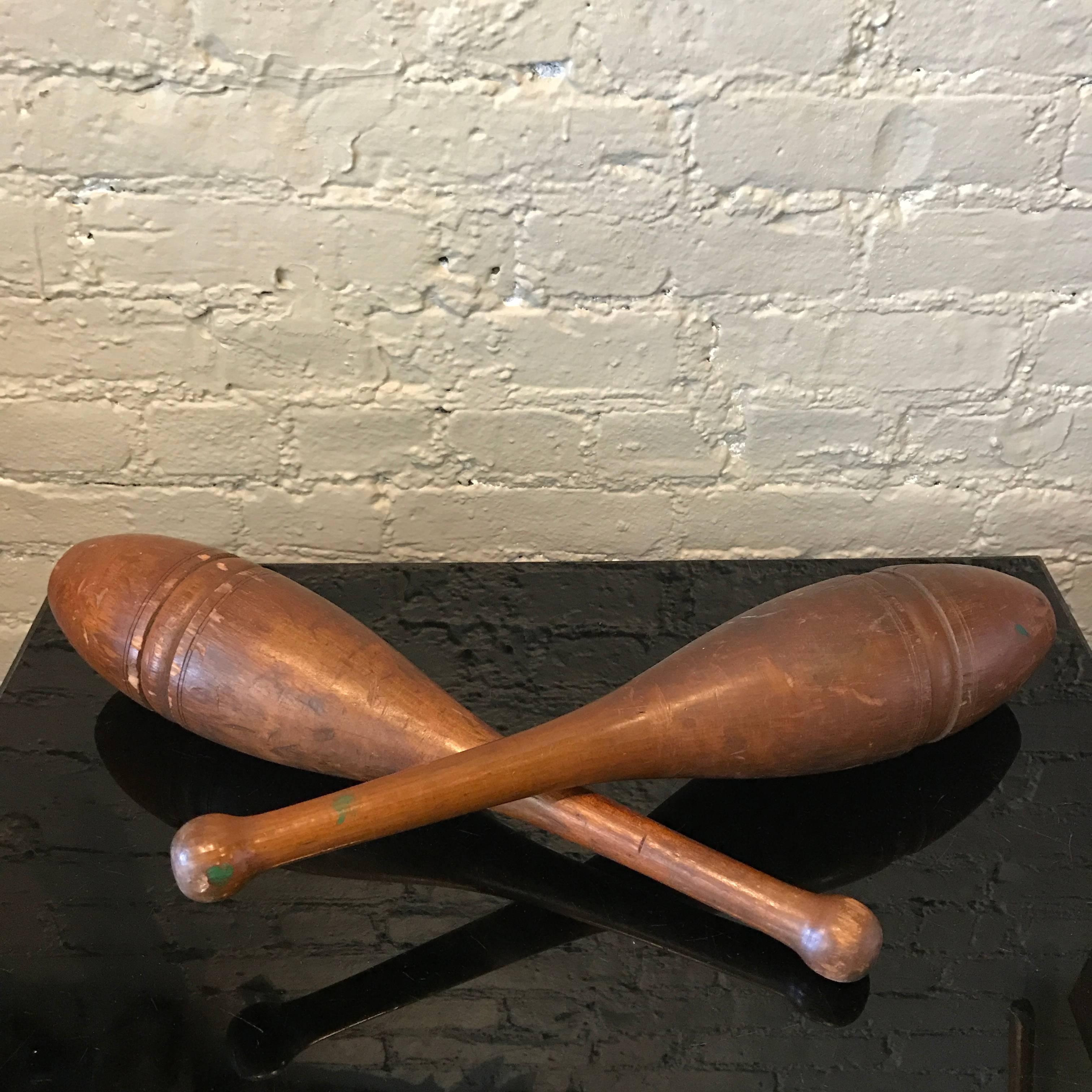 American Pair of Early 20th Century Stained Maple Juggling Pins