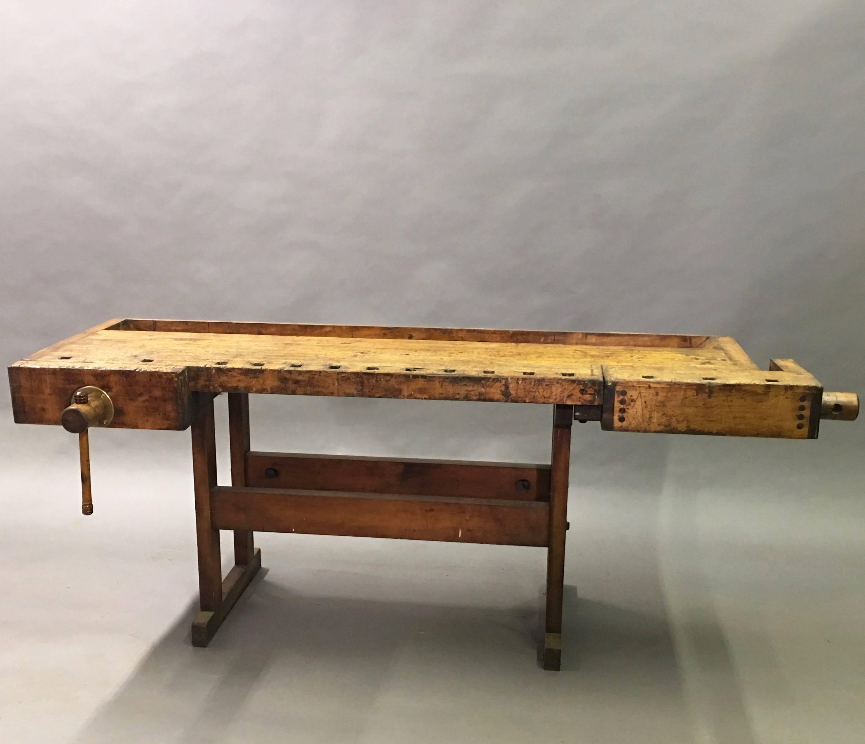 1920s, Industrial, maple work bench or carpenter's table with vise attributed to Hammacher Schlemmer features it's wonderful original work worn patina.