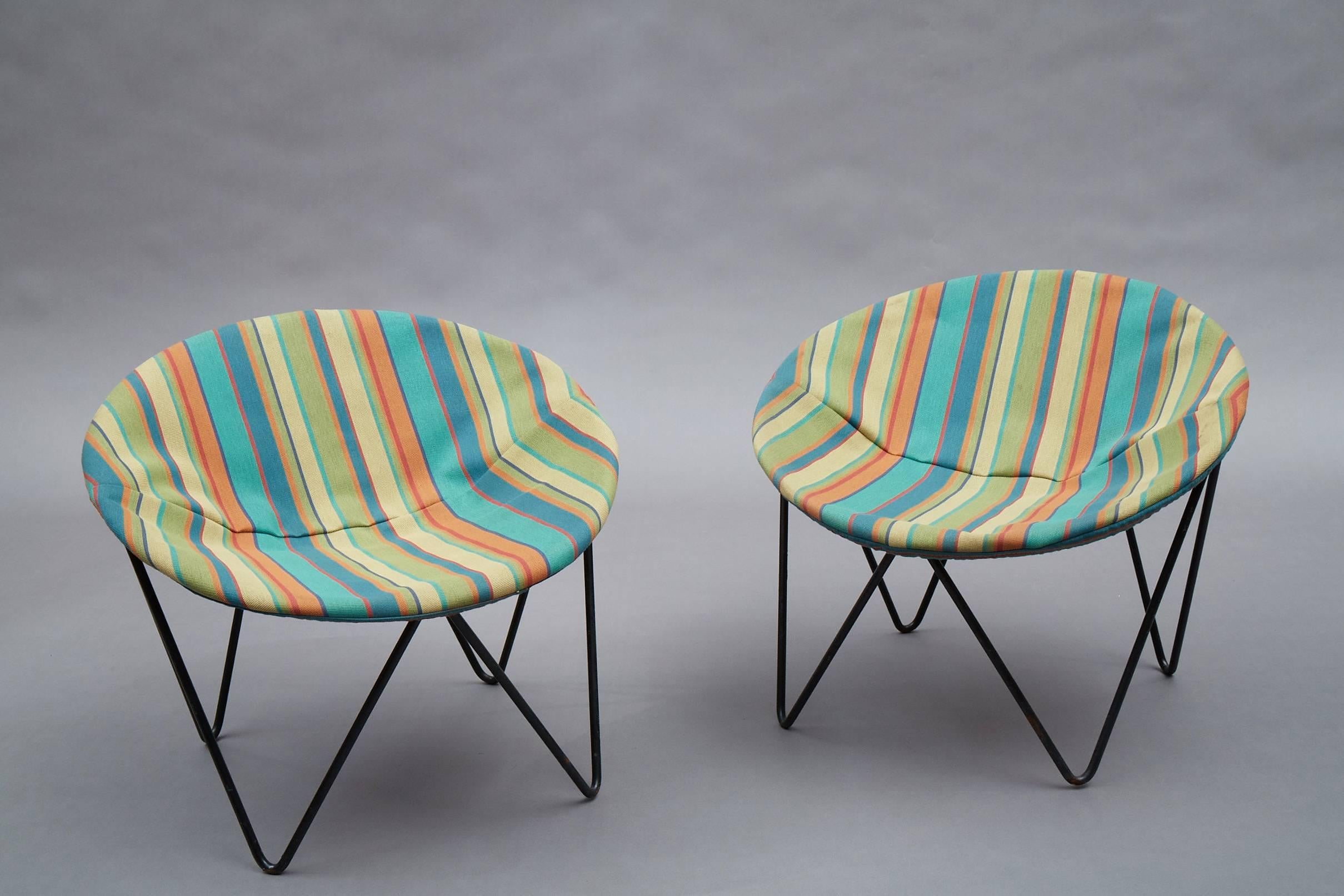 Pair of Mid-Century Modern, children's, hoop chairs with wrought iron frames are newly upholstered a playful striped cotton linen.