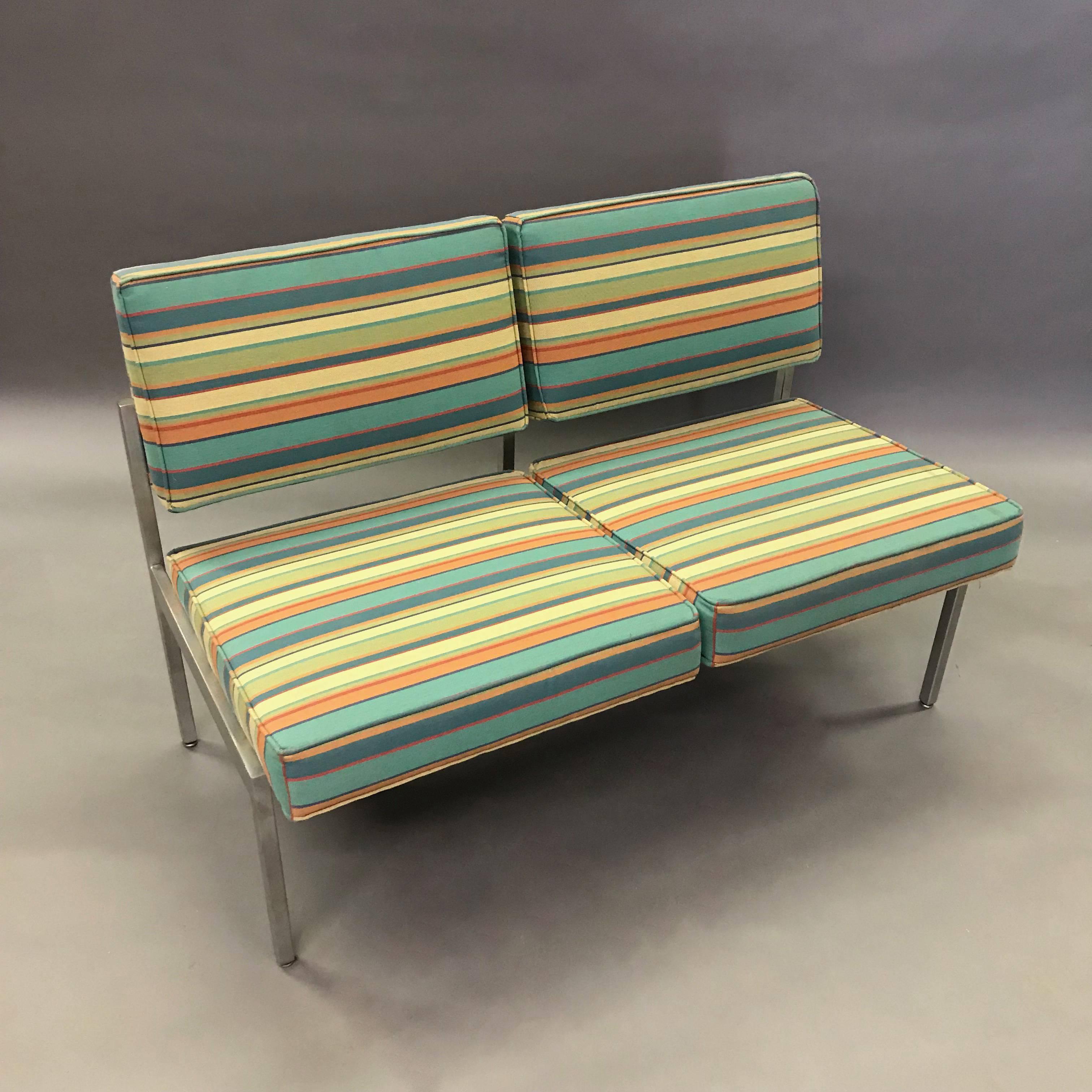 Mid-Century Modern, loveseat sofa with steel frame by Steelcase is newly upholstered in a crisp striped linen blend.