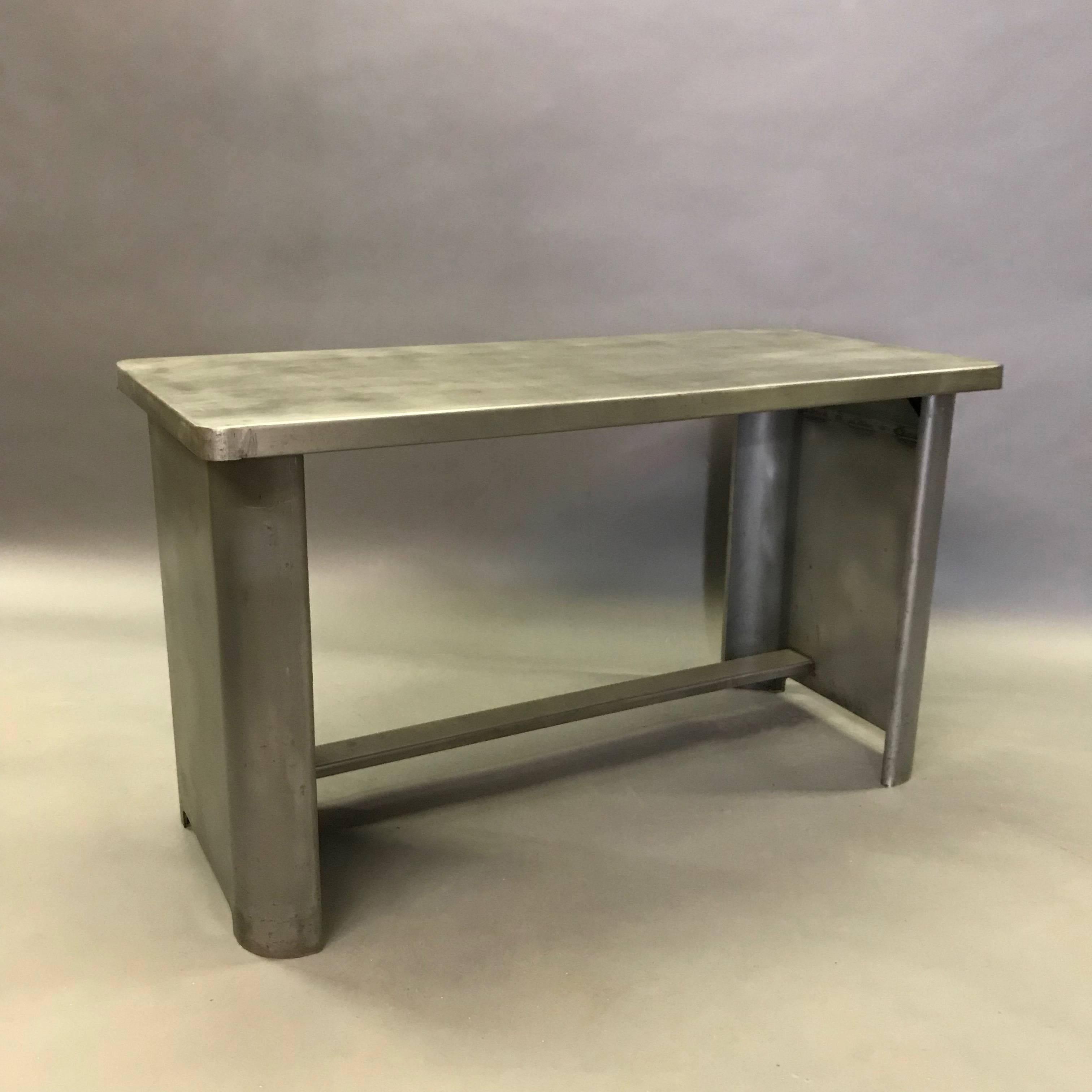 Industrial, 1940s, brushed steel, prep work table or desk features rounded machine-age lines.