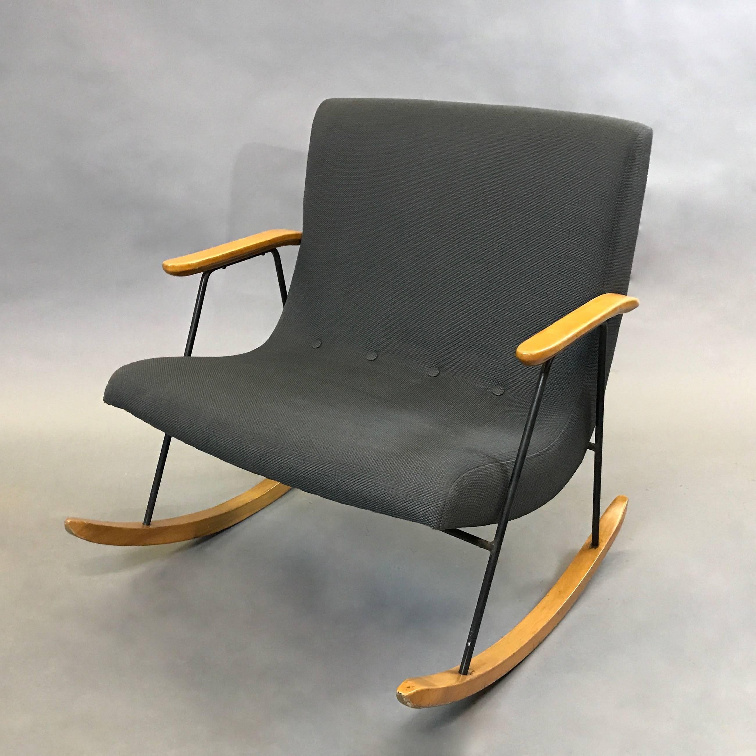 Rare, Mid-Century Modern, “Ozzy” rocking chair designed by Milo Baughman for Thayer Coggin has a sculpted upholstered seat cradled in a maple and wrought iron frame.