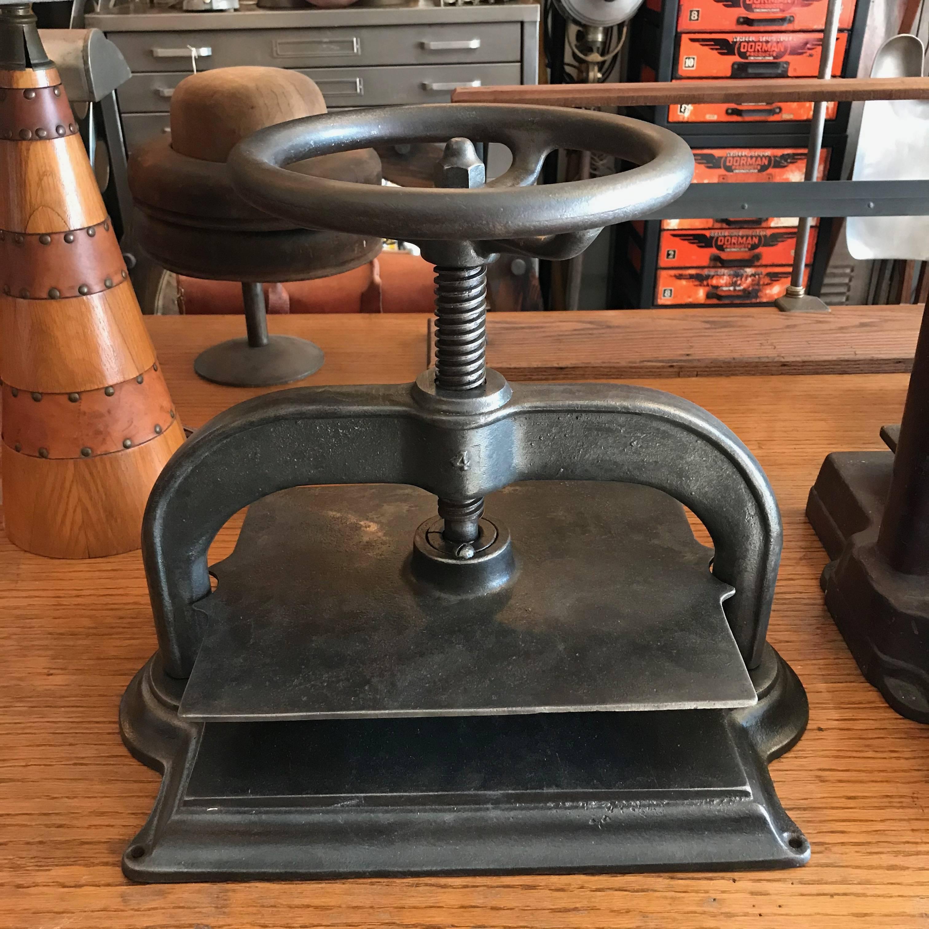 Late 19th century, Industrial, brushed steel book press.